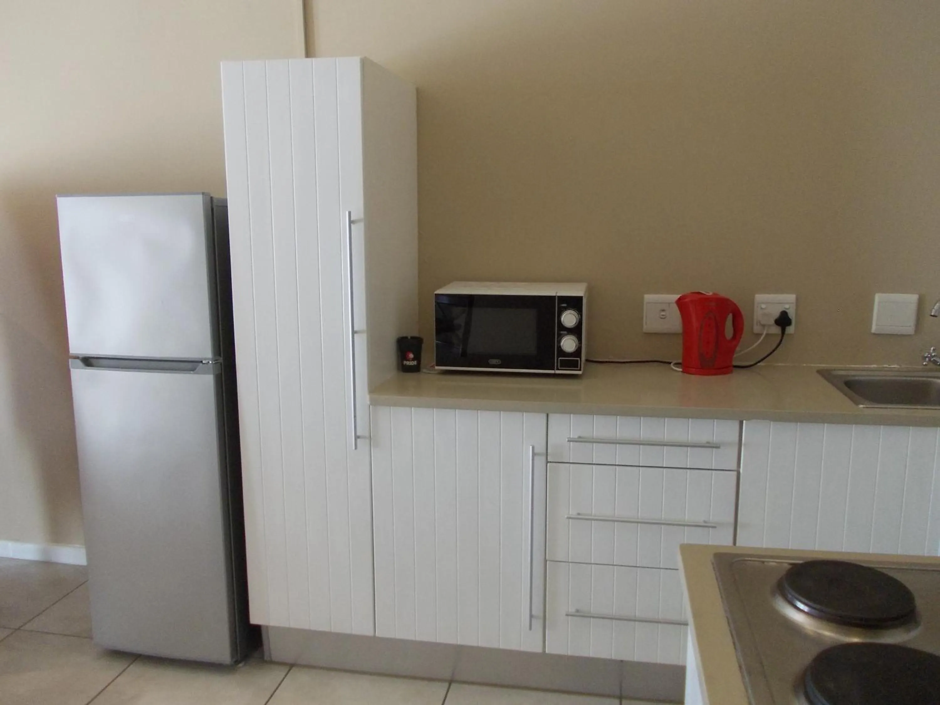 Coffee/tea facilities, Kitchen/Kitchenette in Point Village Hotel and Self Catering