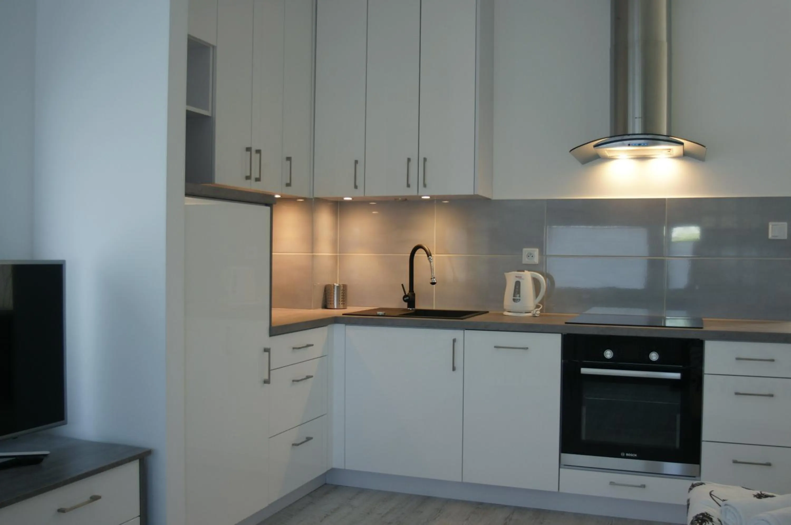 Kitchen or kitchenette in Q Apartamenty