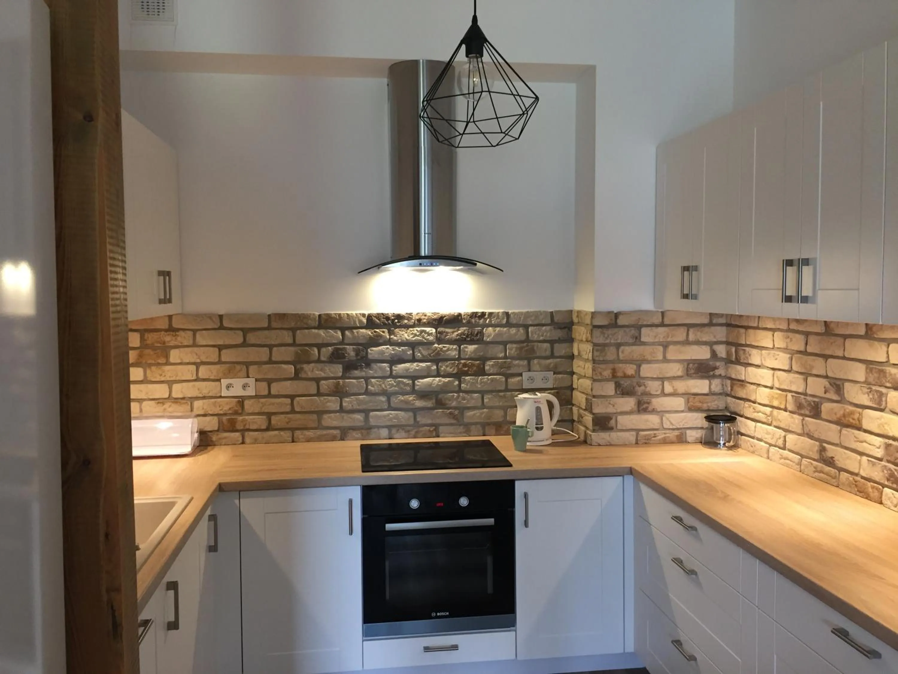 Kitchen or kitchenette in Q Apartamenty