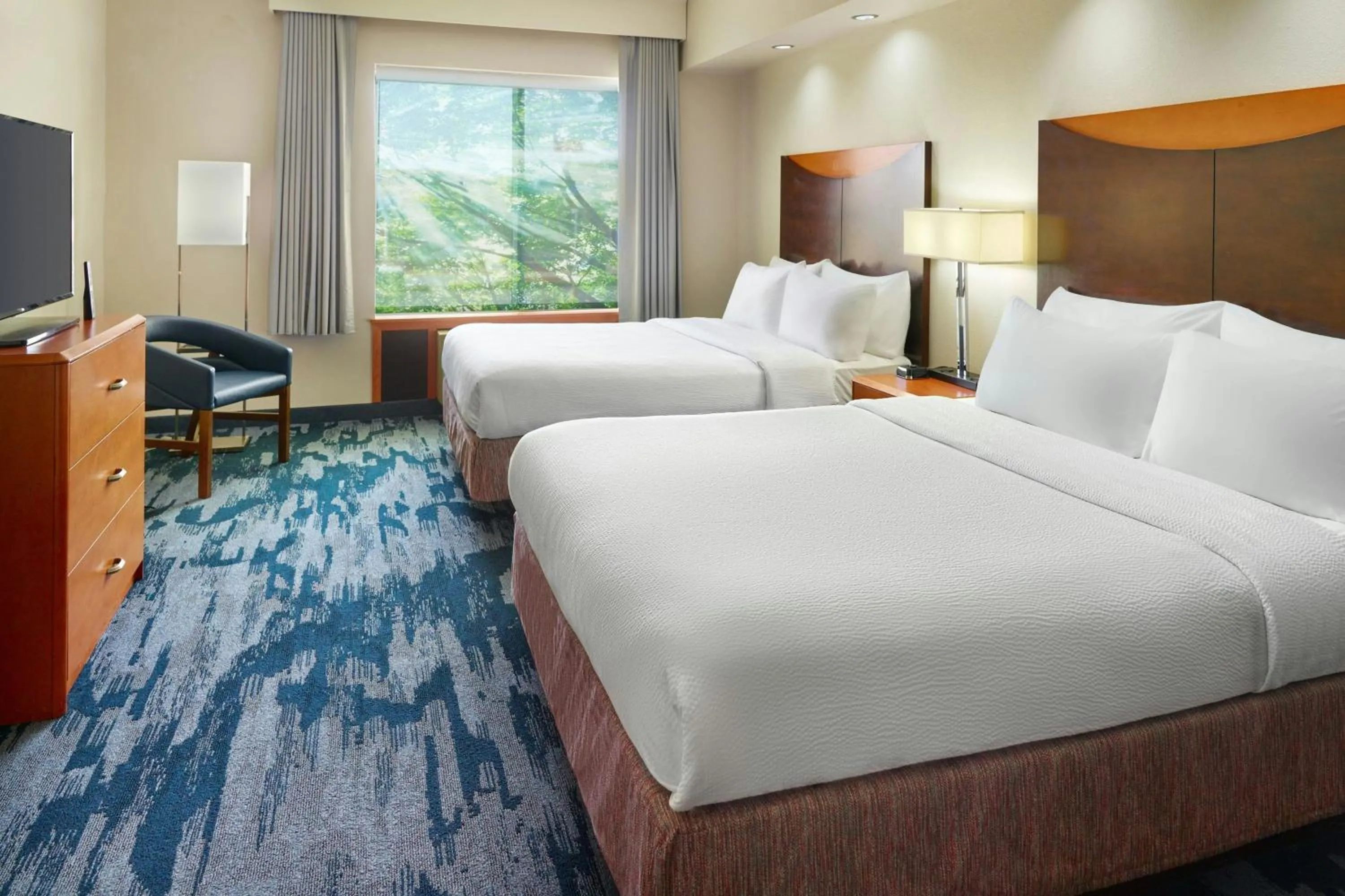 Photo of the whole room, Bed in Fairfield Inn & Suites by Marriott Commerce