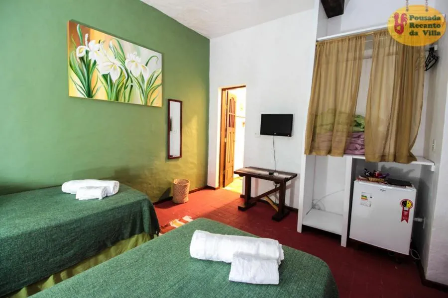 Bed in Pousada Recanto da Villa