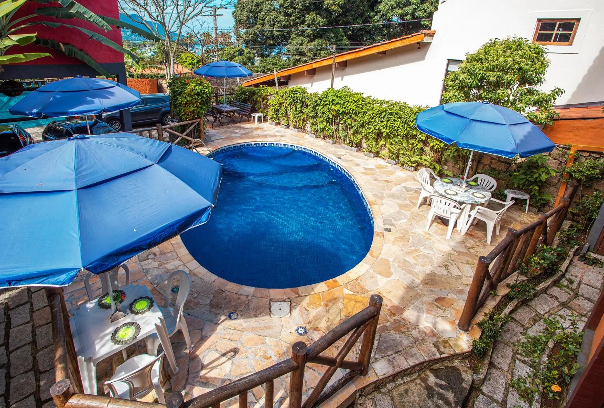 Swimming pool in Pousada Recanto da Villa