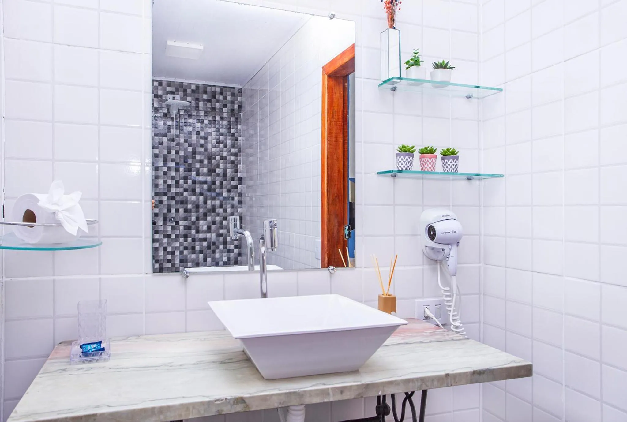 Shower in Pousada Recanto da Villa