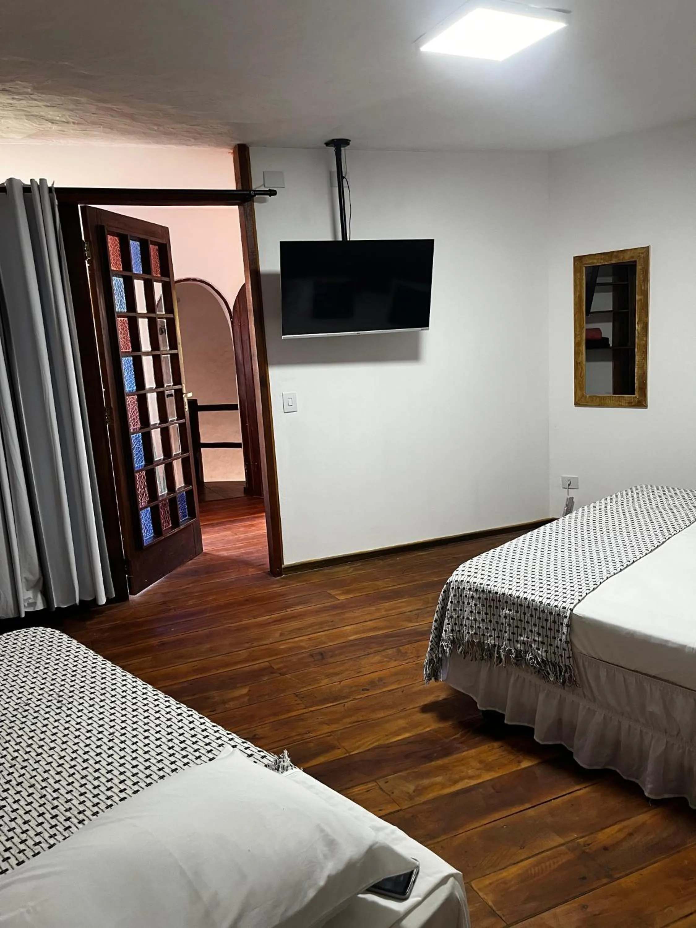 Bed in Pousada Recanto da Villa