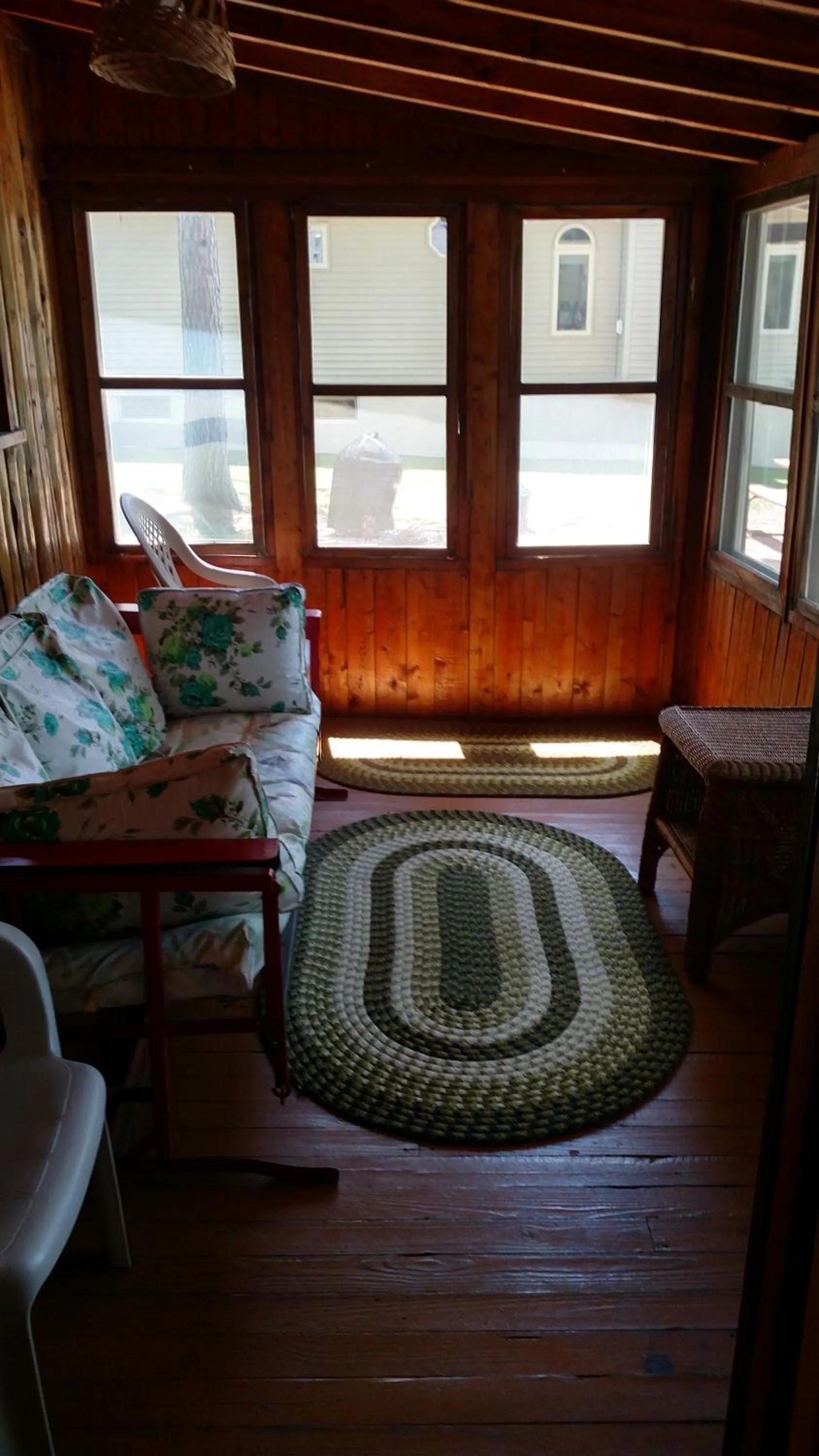 Seating area, Bed in Log Cottage on Blue Lake