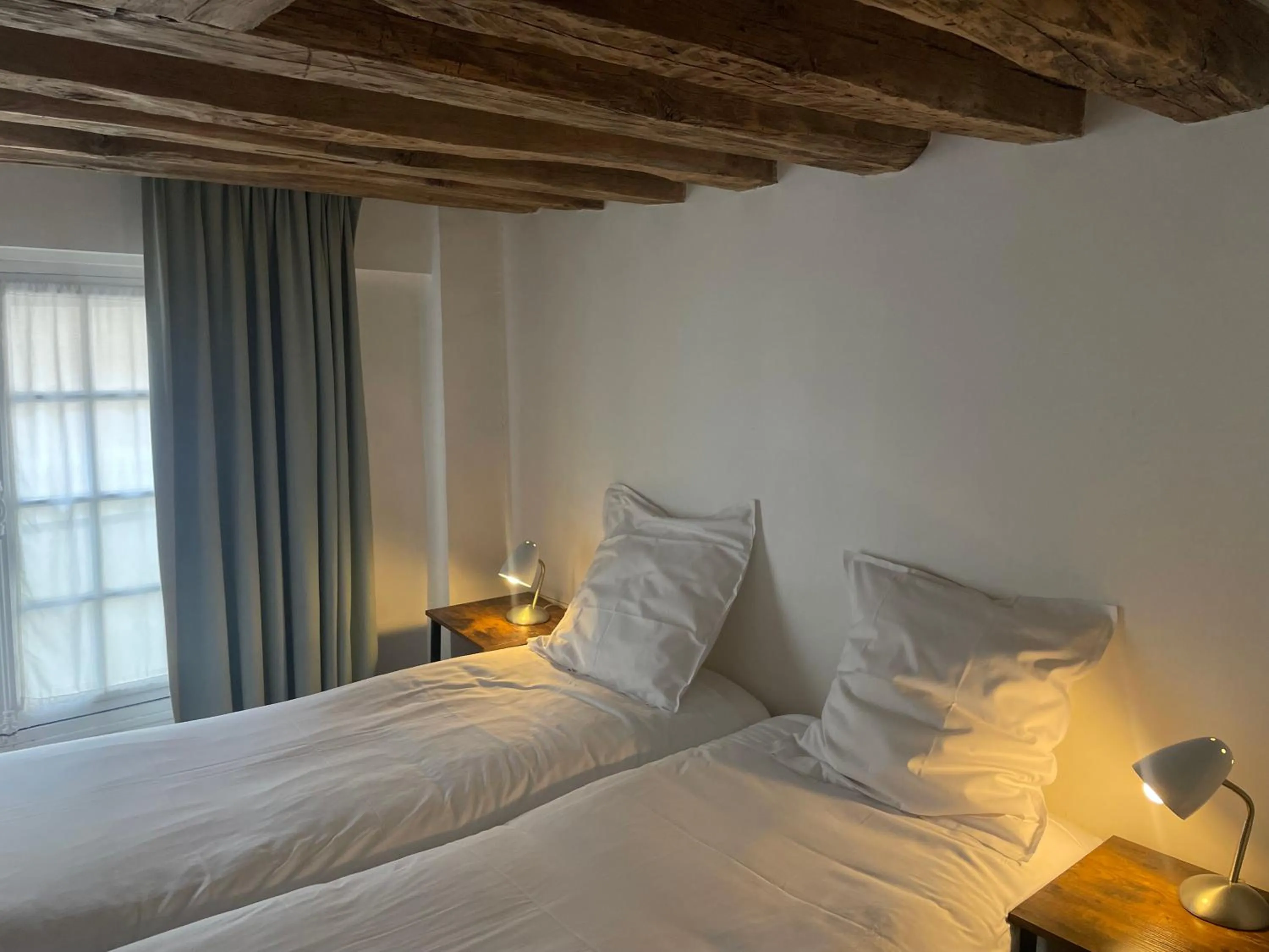 Bedroom in Hôtel Du Jeu De Paume