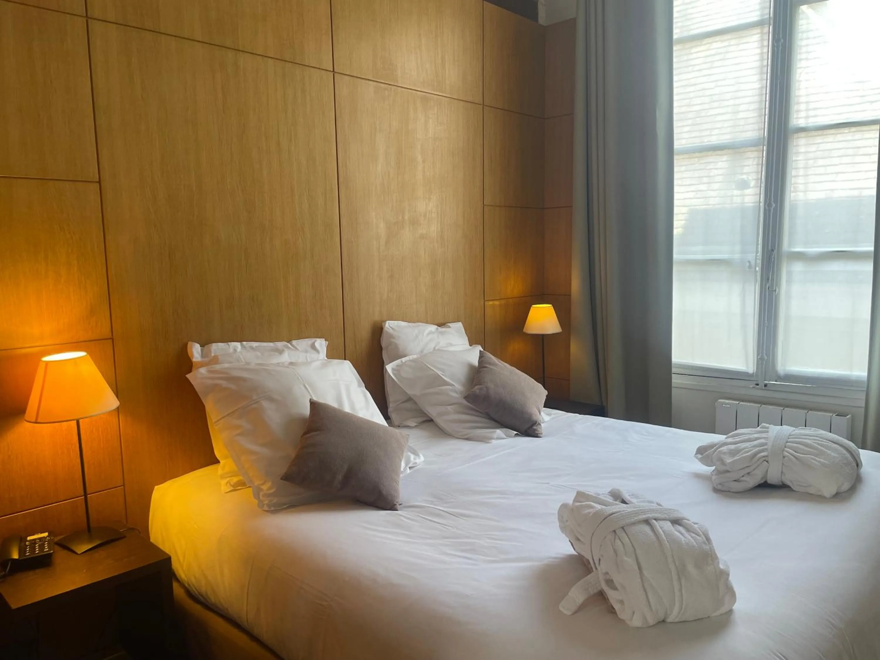 Bed in Hôtel Du Jeu De Paume