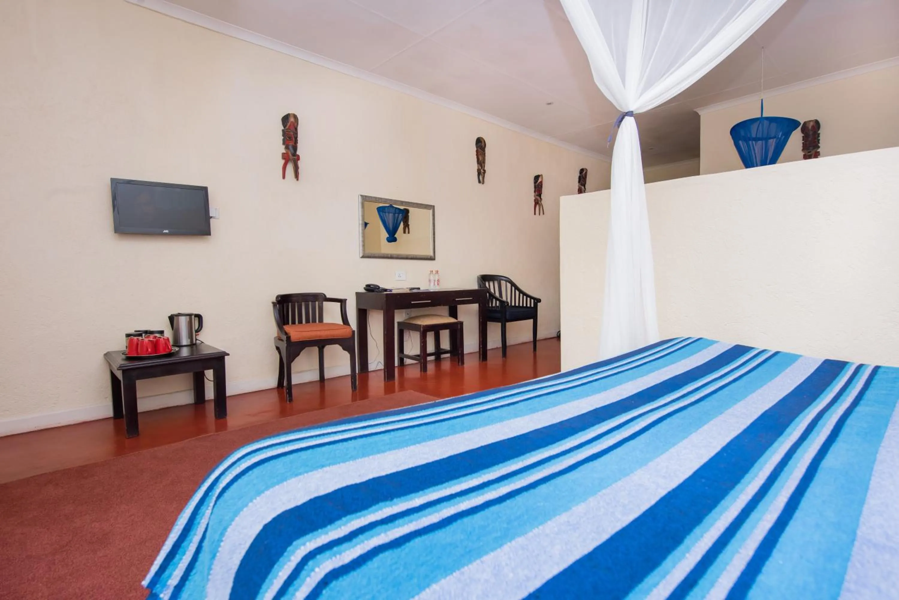 Bed in Game Haven Lodge