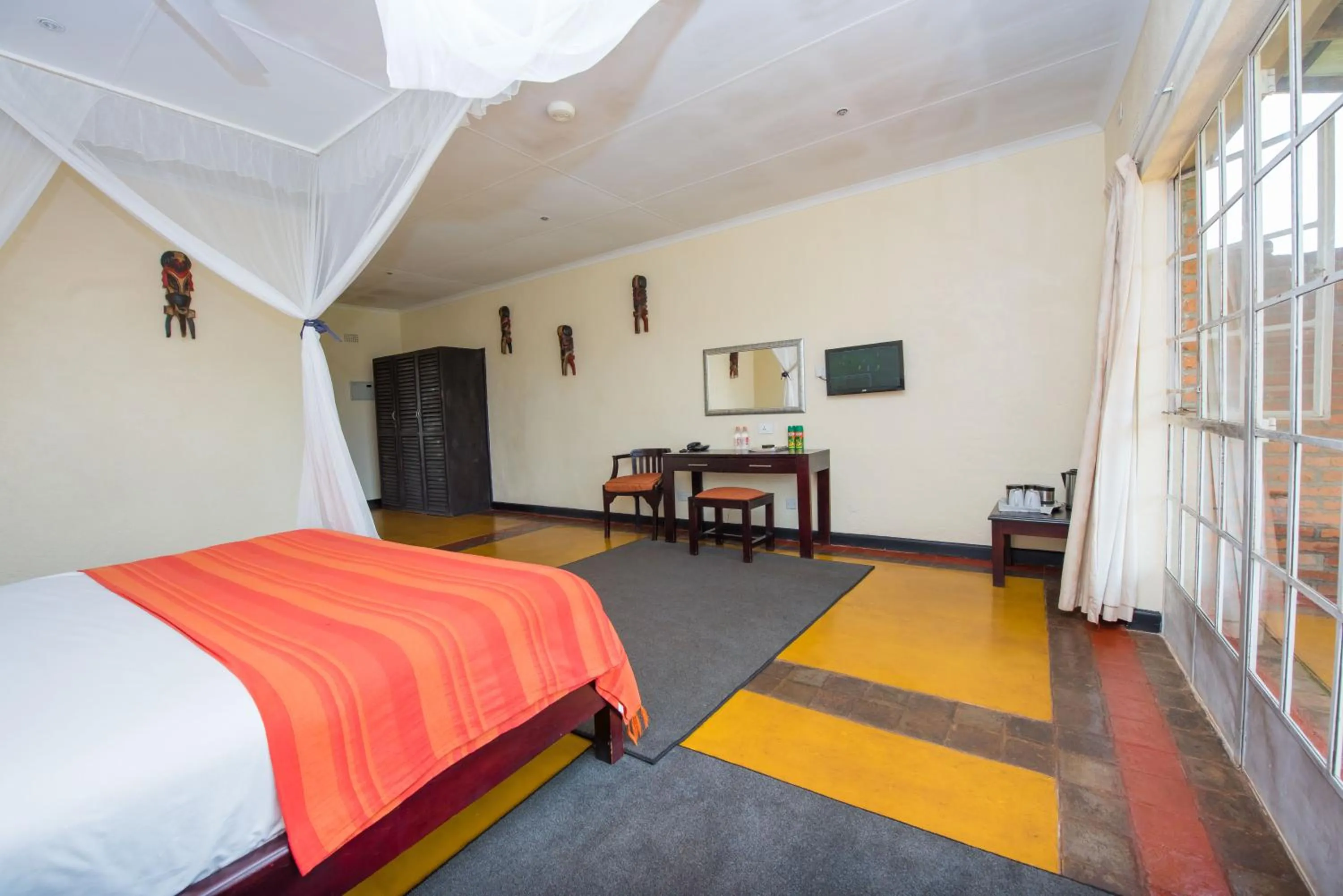 Bed in Game Haven Lodge