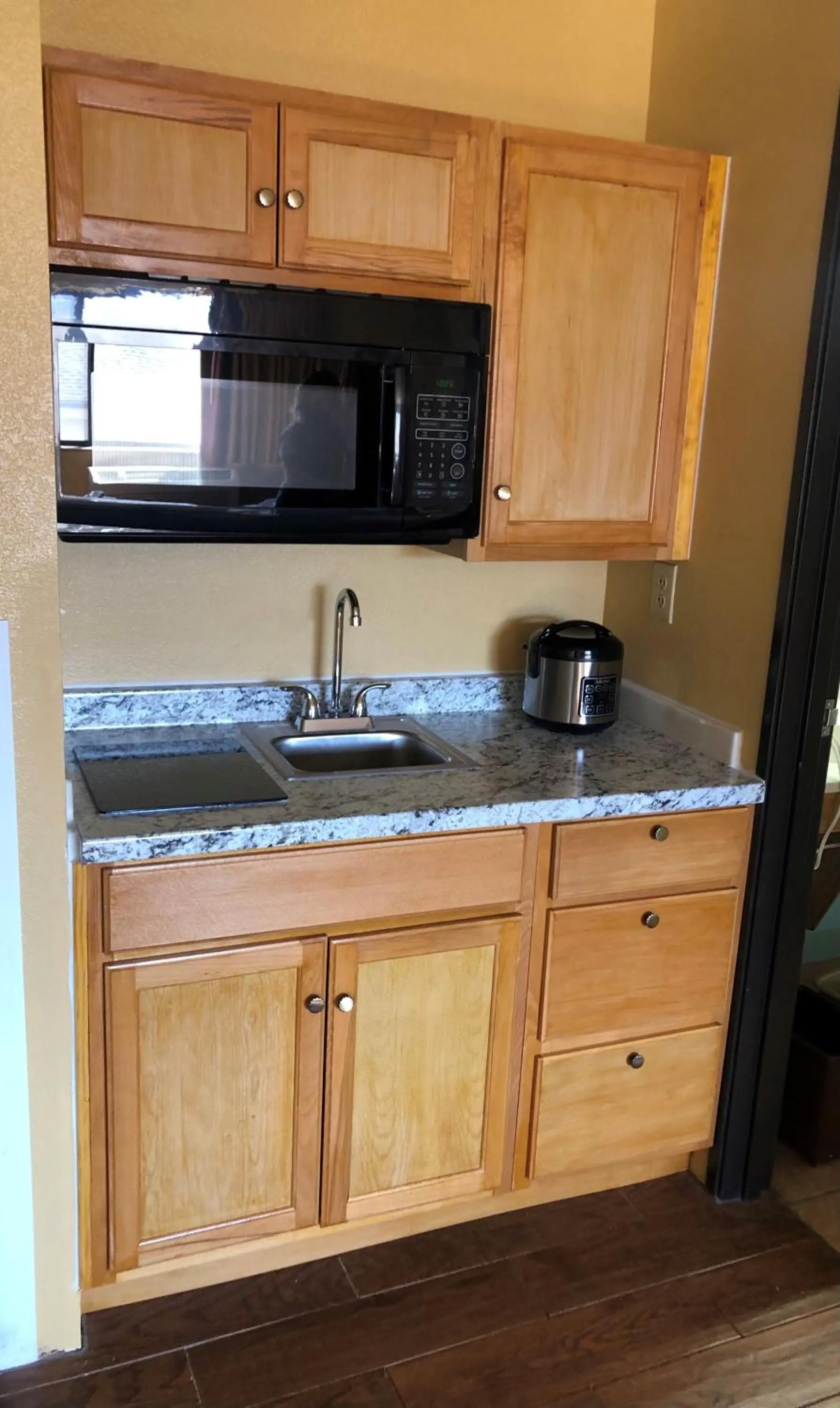 Kitchen or kitchenette in Super 8 by Wyndham Cedar City