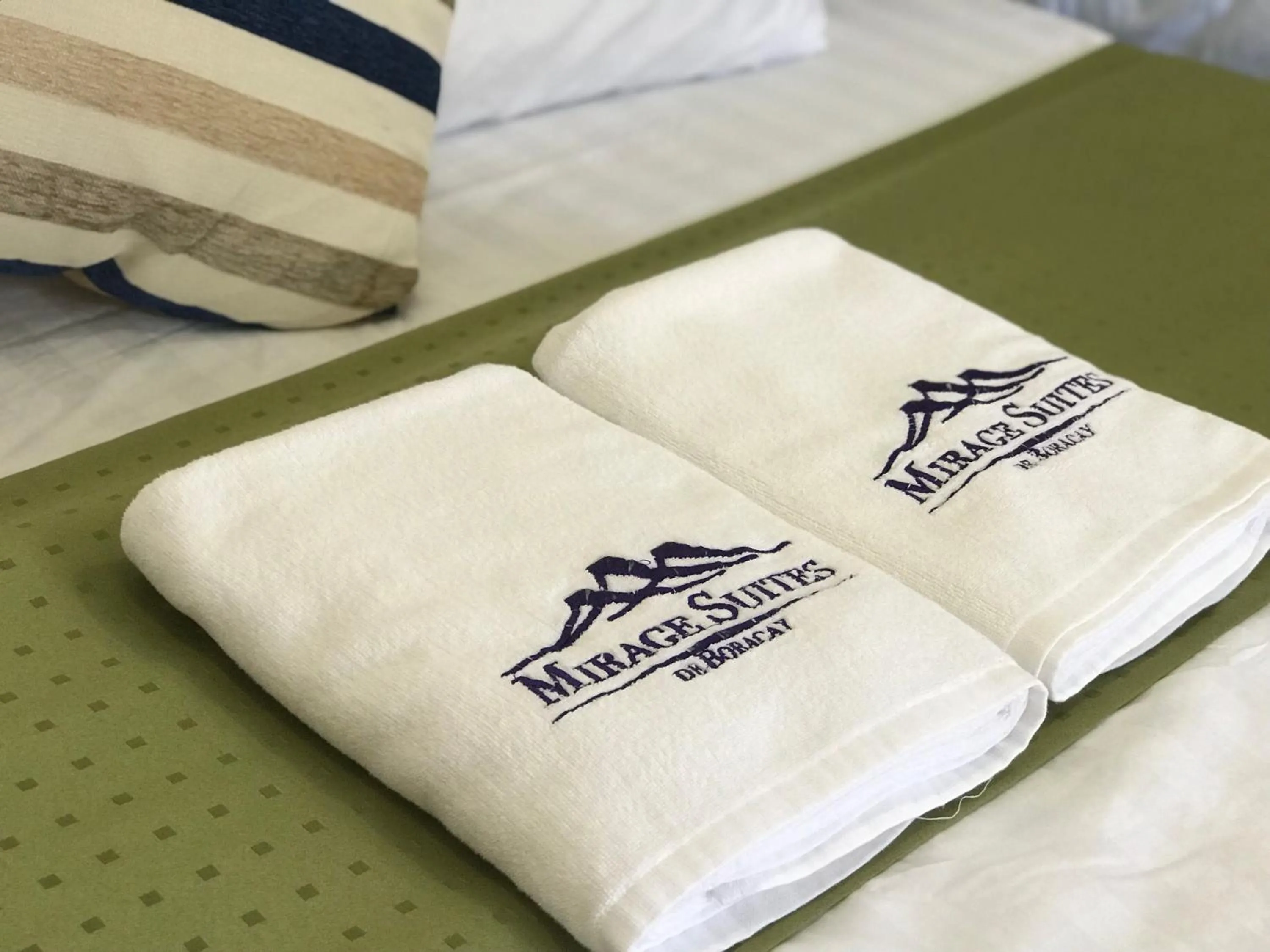 towels, Bed in Mirage Suites de Boracay