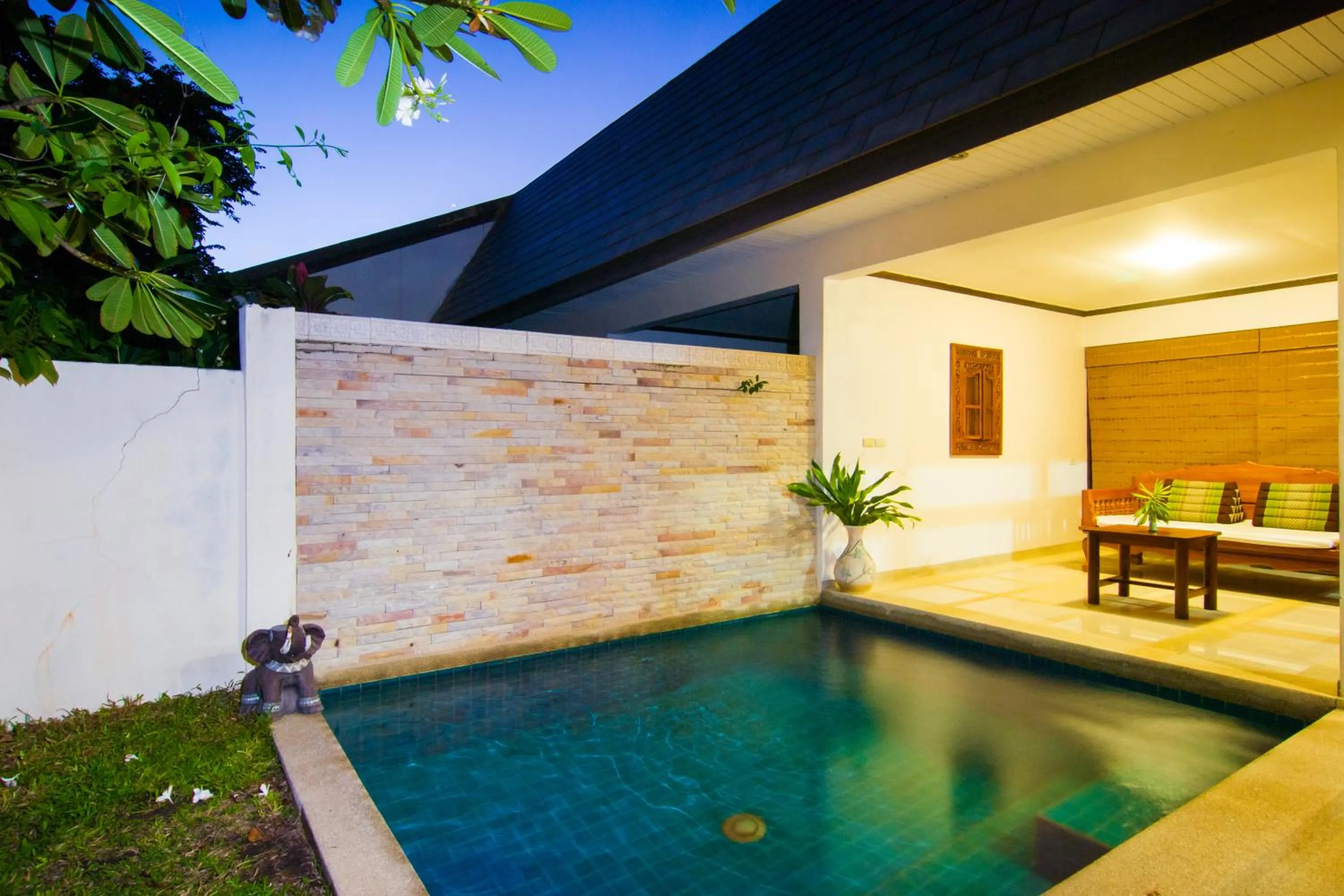 Swimming pool in Coco Palm Beach Resort - SHA Extra Plus