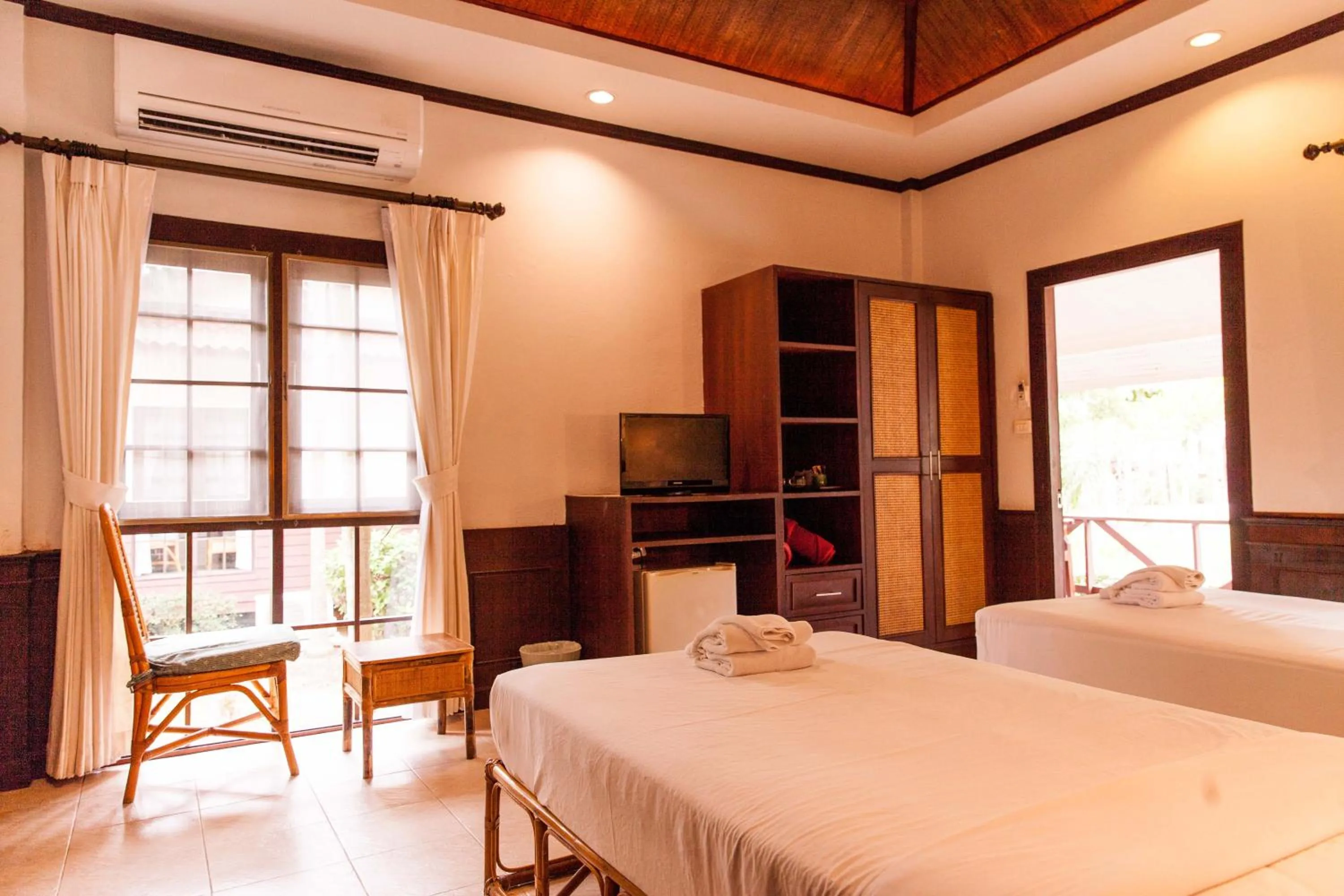 Bed in Coco Palm Beach Resort - SHA Extra Plus