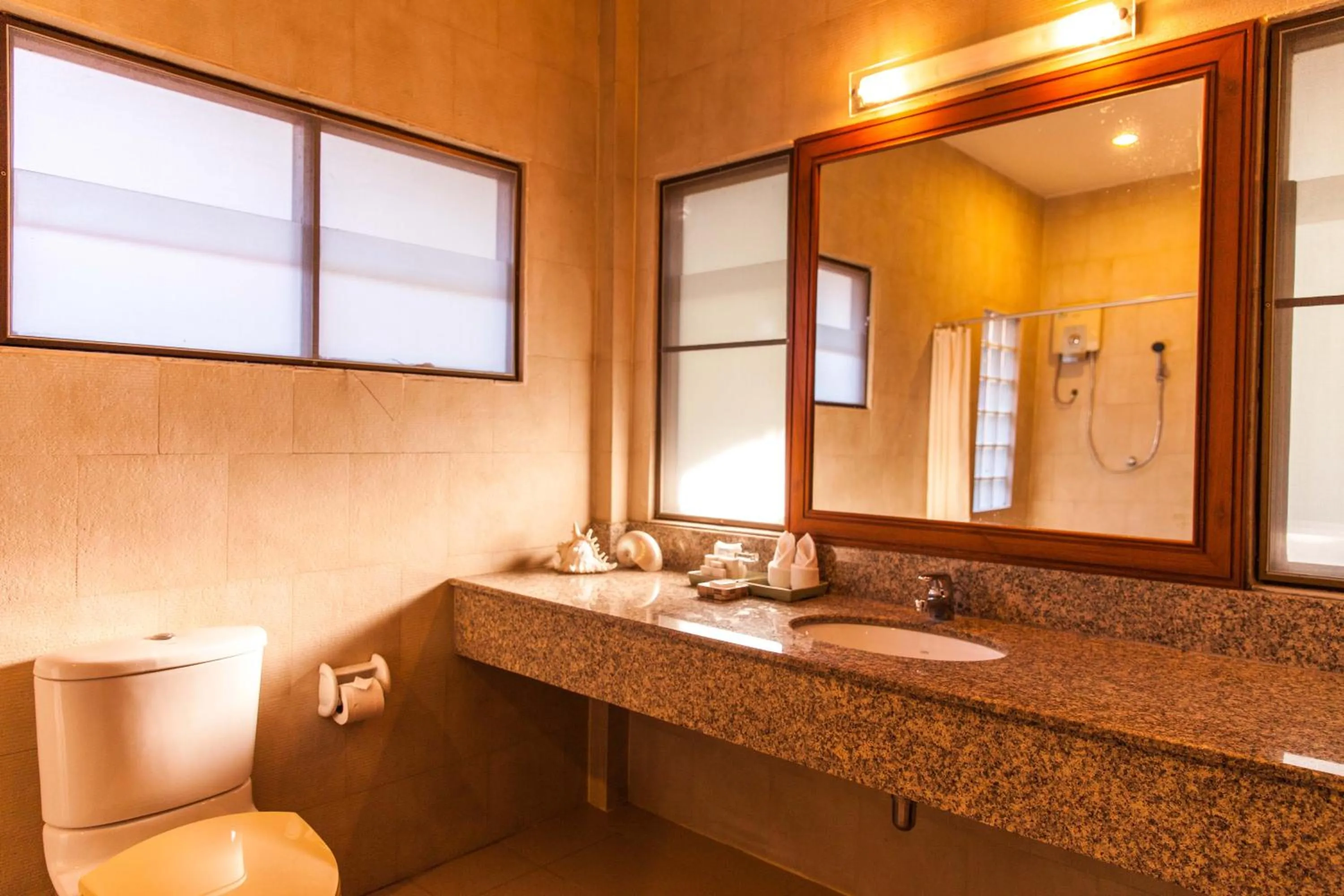 Bathroom in Coco Palm Beach Resort - SHA Extra Plus