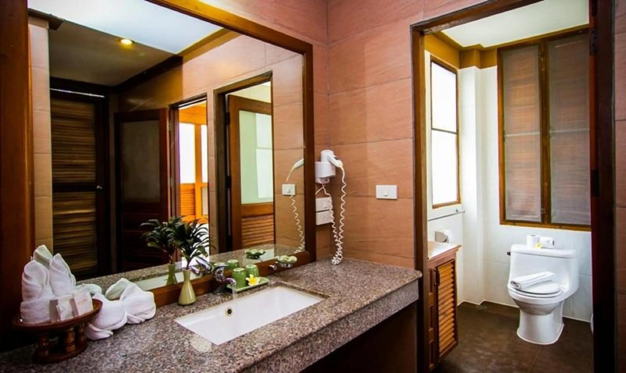 Toilet in Coco Palm Beach Resort - SHA Extra Plus