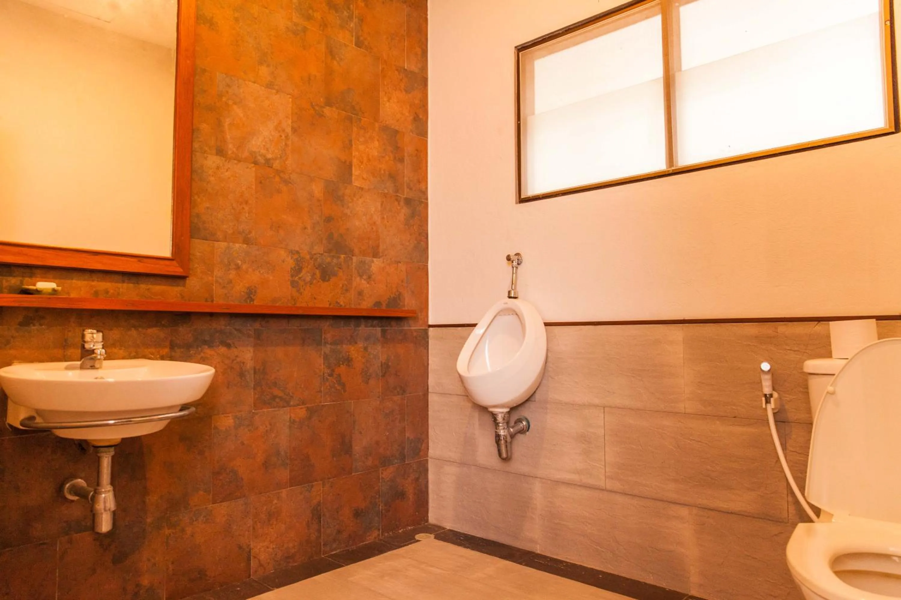 Bathroom in Coco Palm Beach Resort - SHA Extra Plus