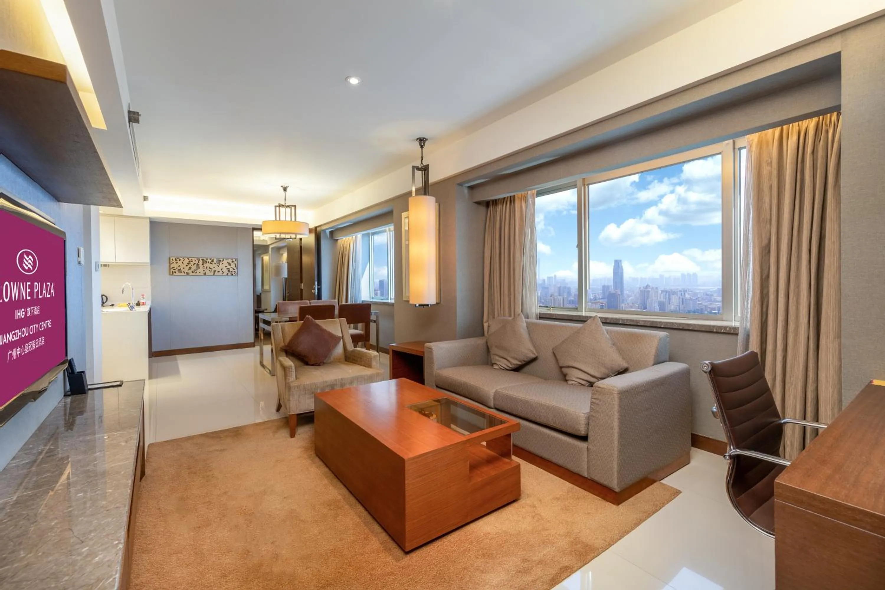 Living room in Crowne Plaza Guangzhou City Centre by IHG