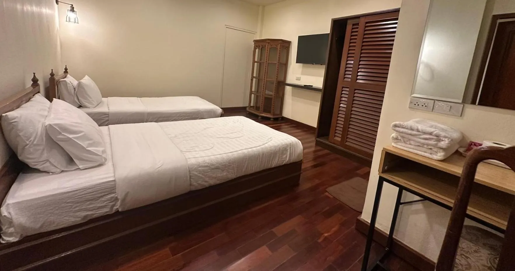 Bed in Prince Hotel Chiang Mai