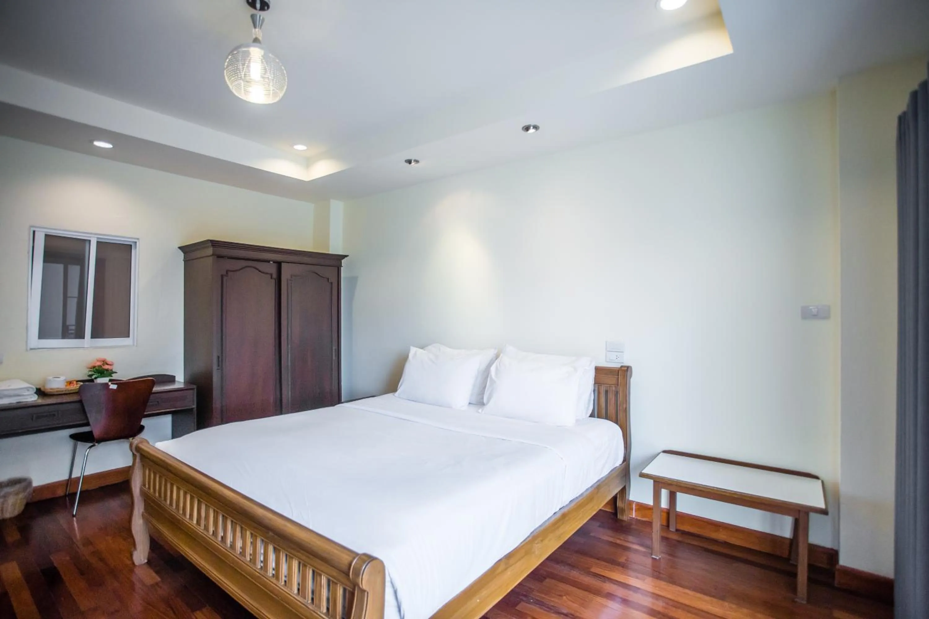 Bed in Prince Hotel Chiang Mai