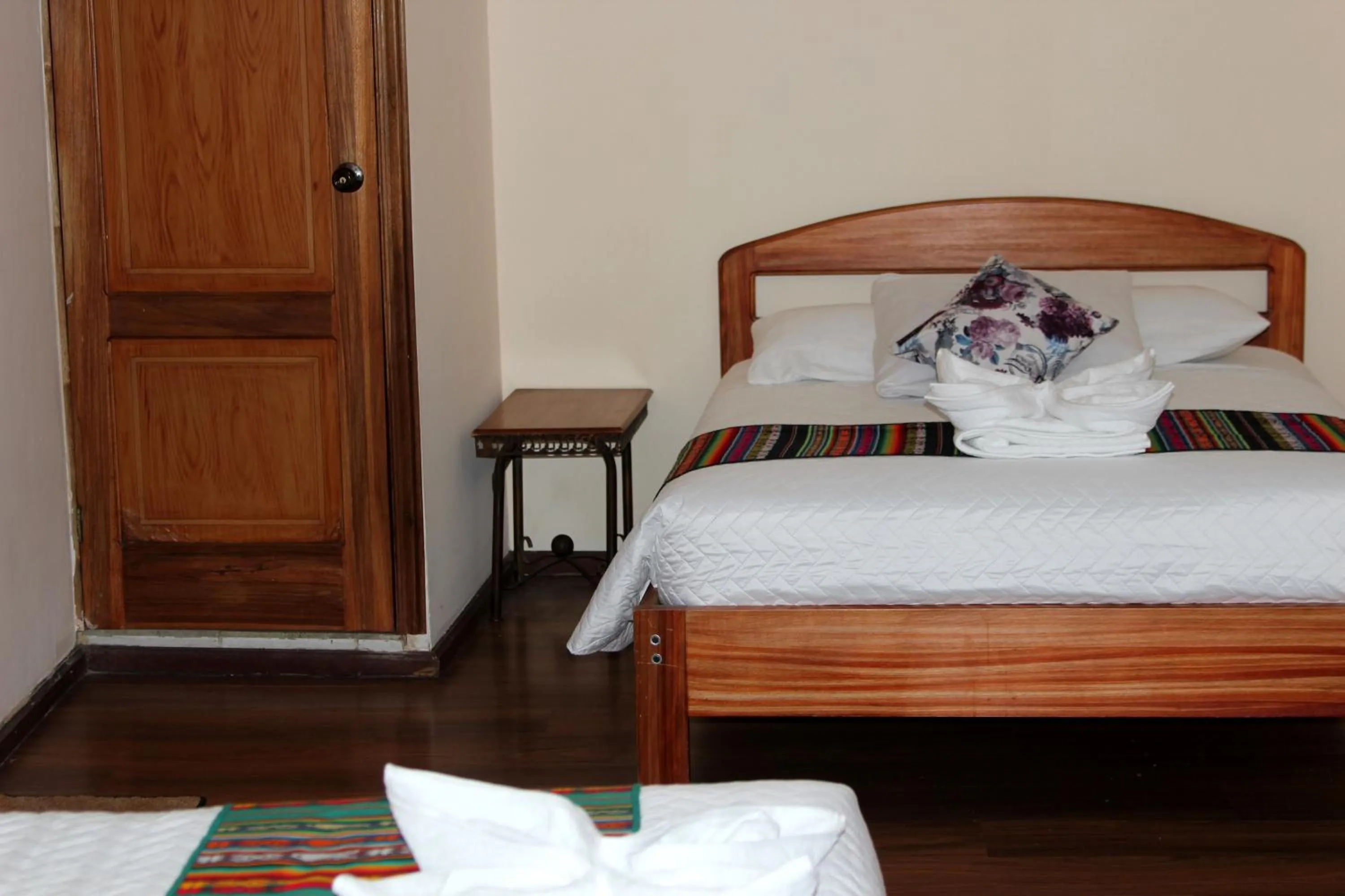 Bed in Mía Leticia B&B