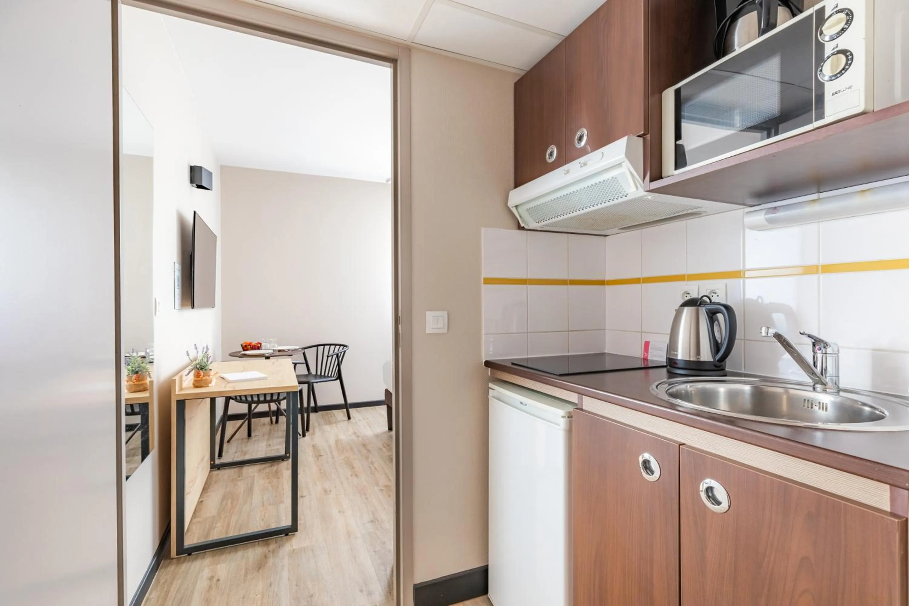 Kitchen or kitchenette in Appart'City Classic Montelimar