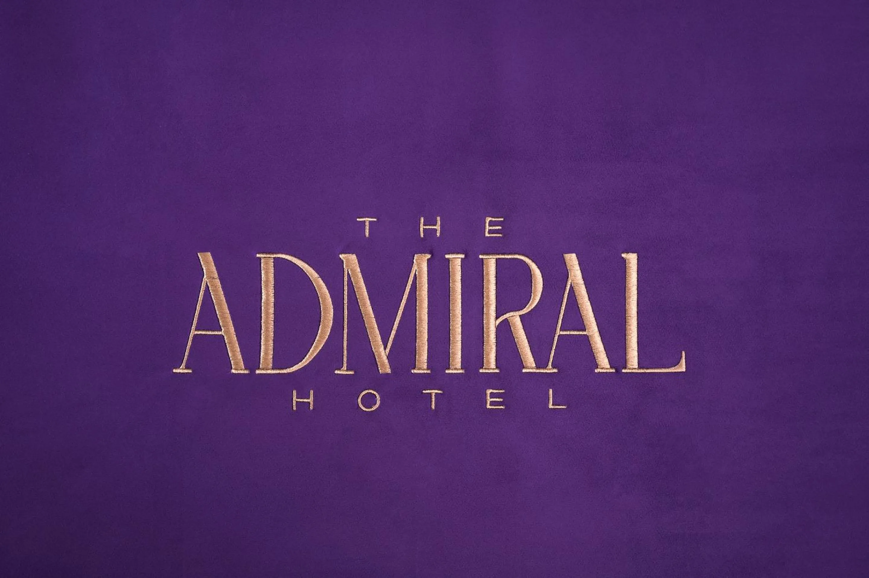 Bed in The Admiral, Downtown Historic District