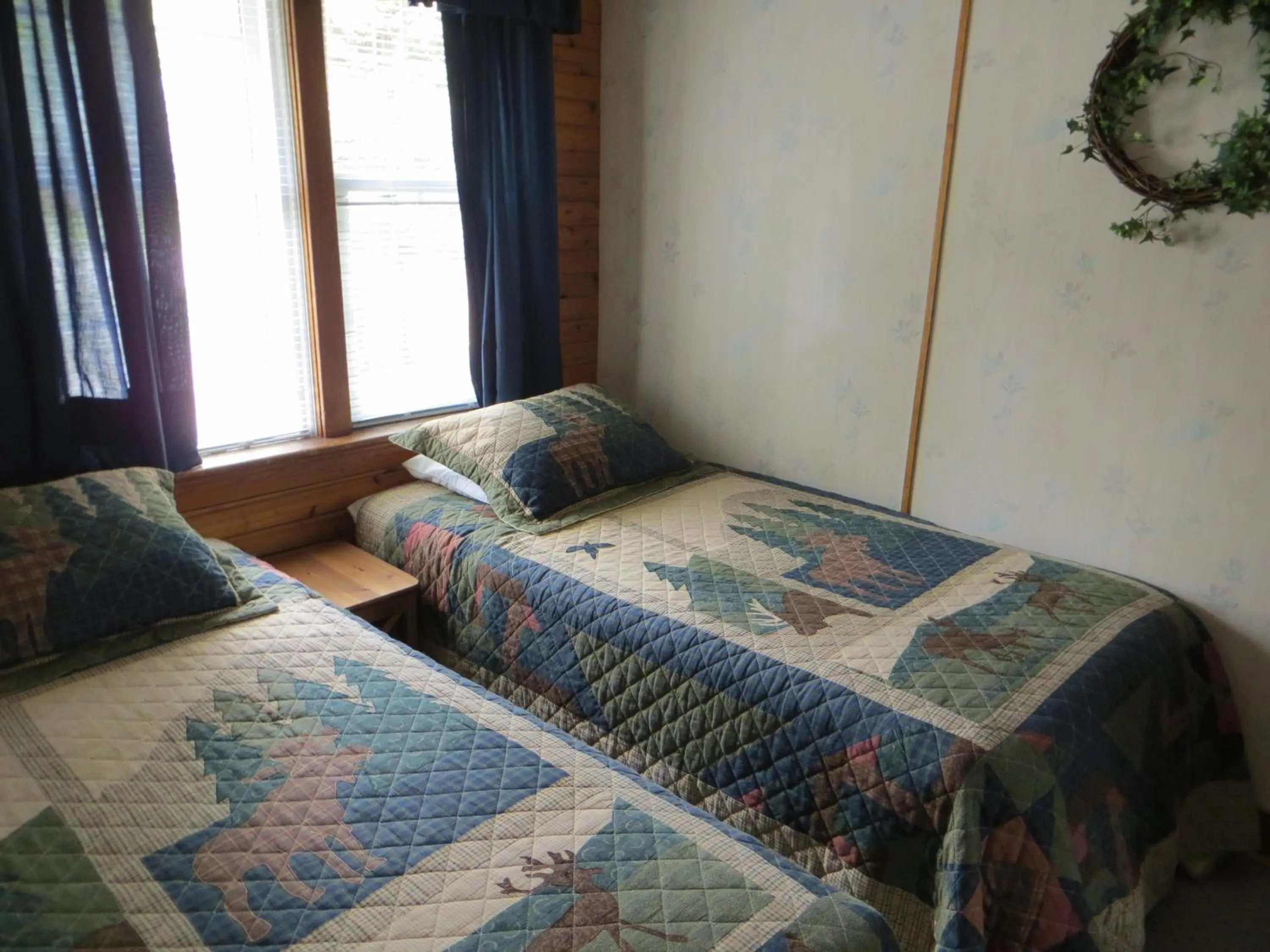 Bed in Crandell Mountain Lodge