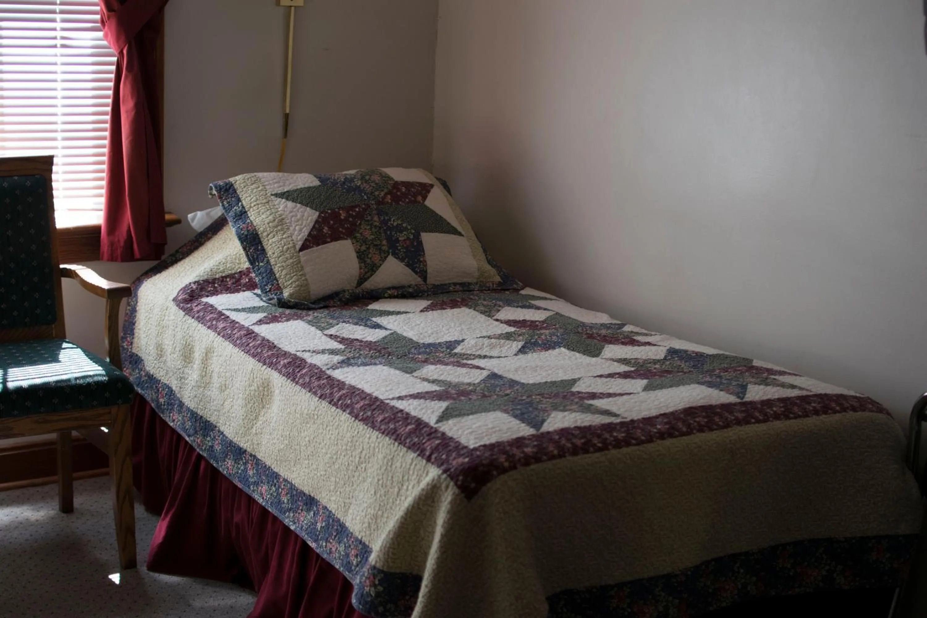 Bed in Crandell Mountain Lodge