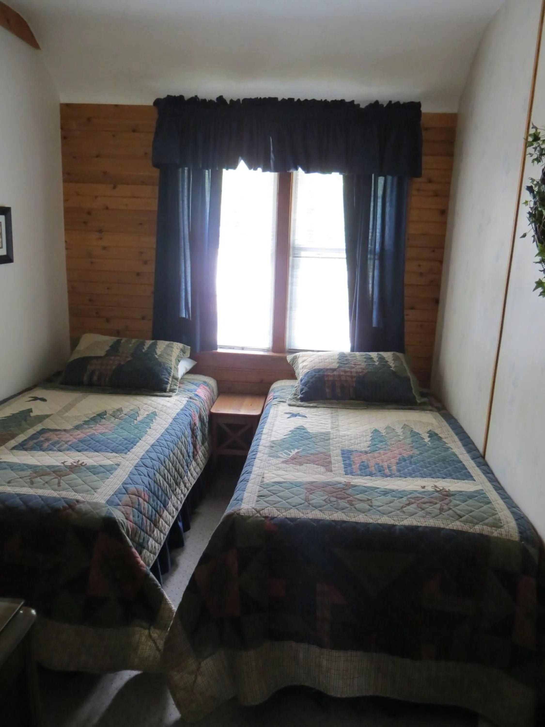 Bed in Crandell Mountain Lodge