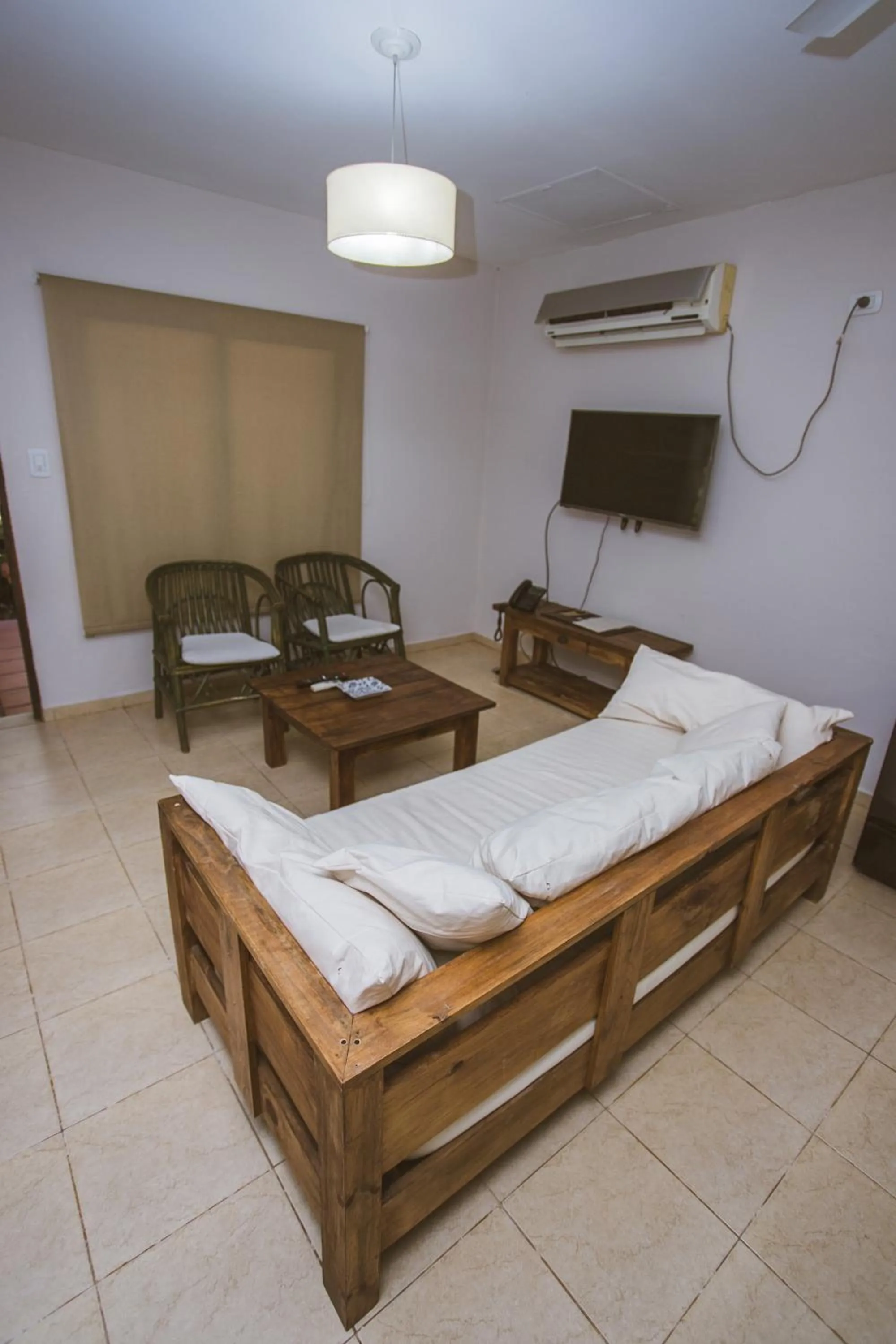 Bed in Río Arriba Suites & Apartments & Restó