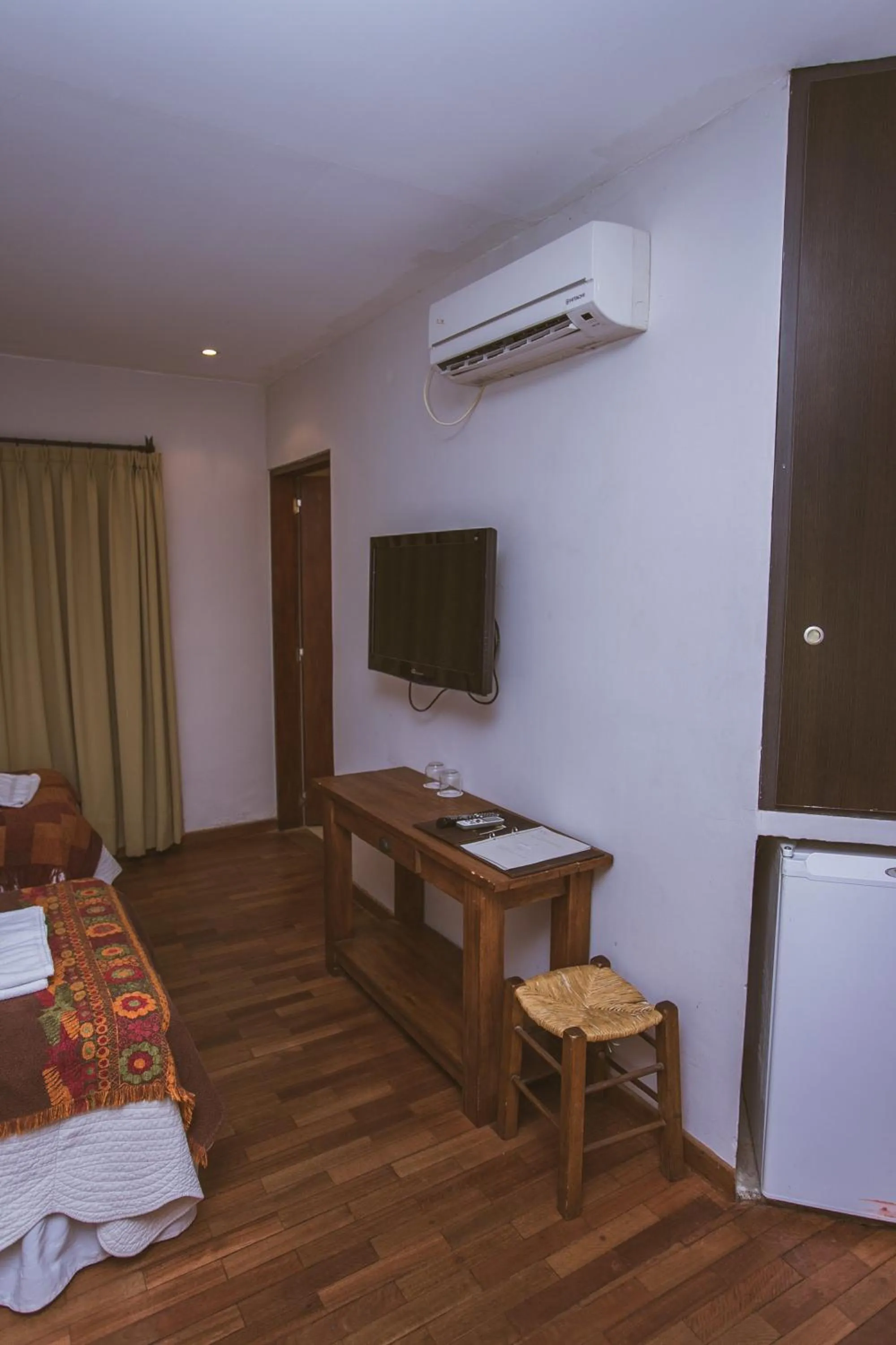 Bed in Río Arriba Suites & Apartments & Restó