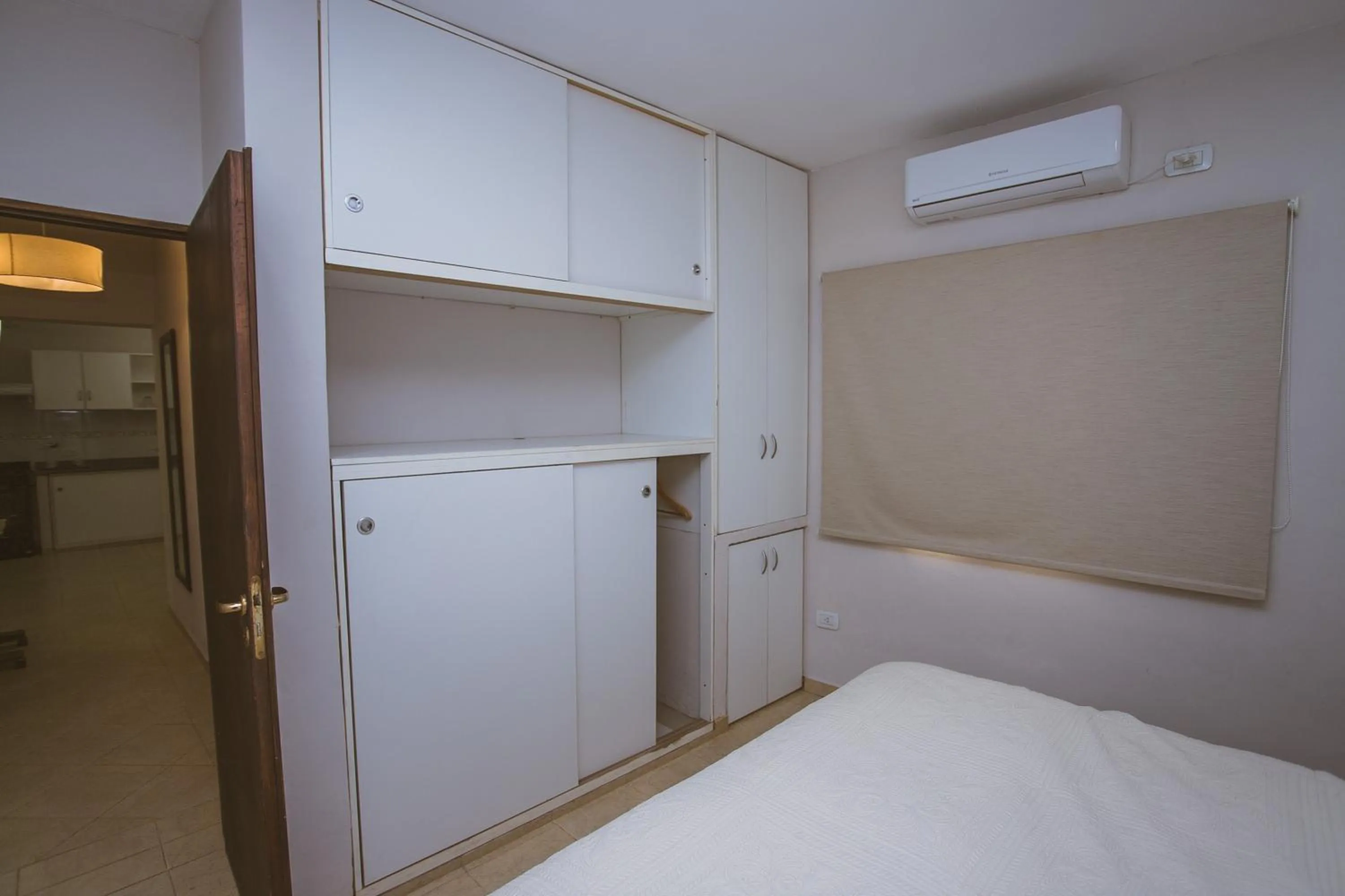 Bed in Río Arriba Suites & Apartments & Restó