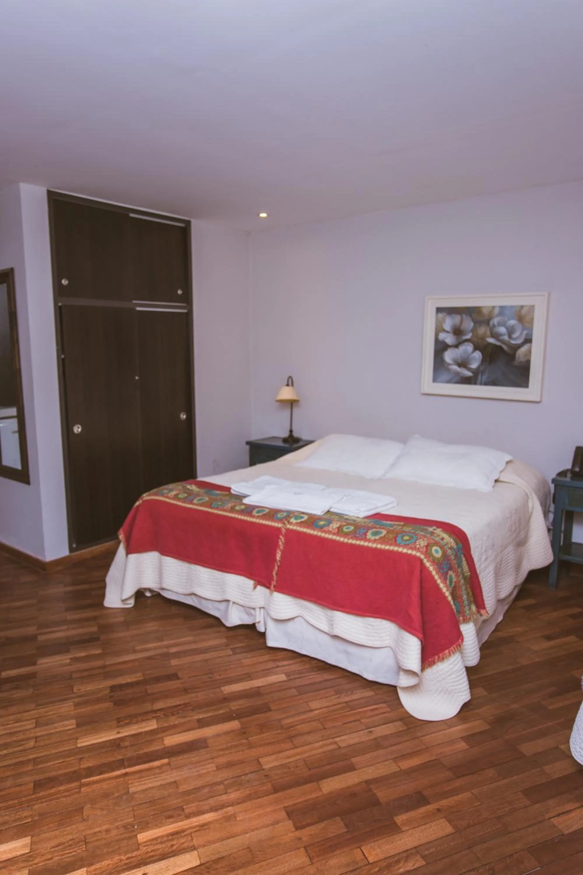 Bed in Río Arriba Suites & Apartments & Restó