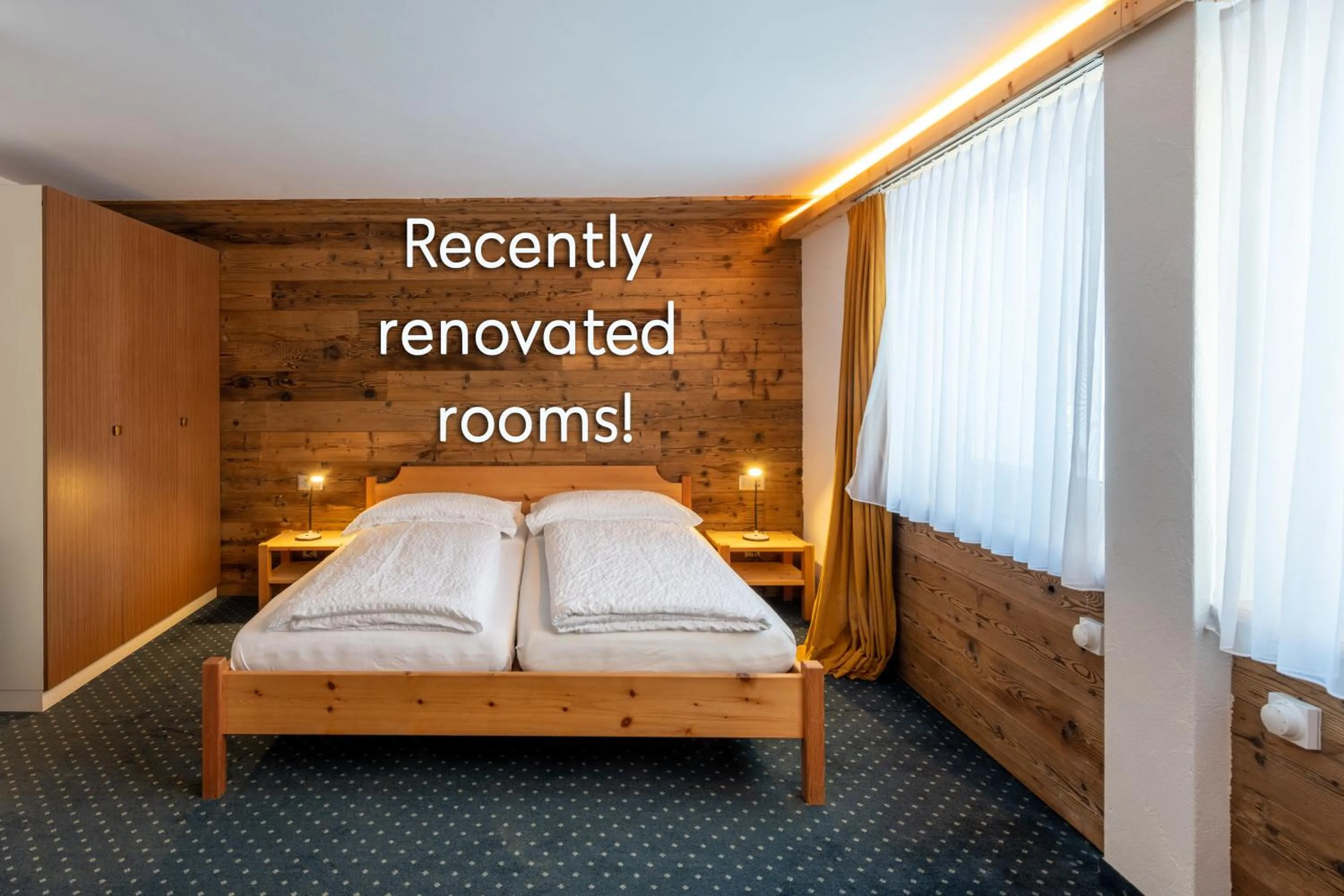 Bed in Hotel Grischuna