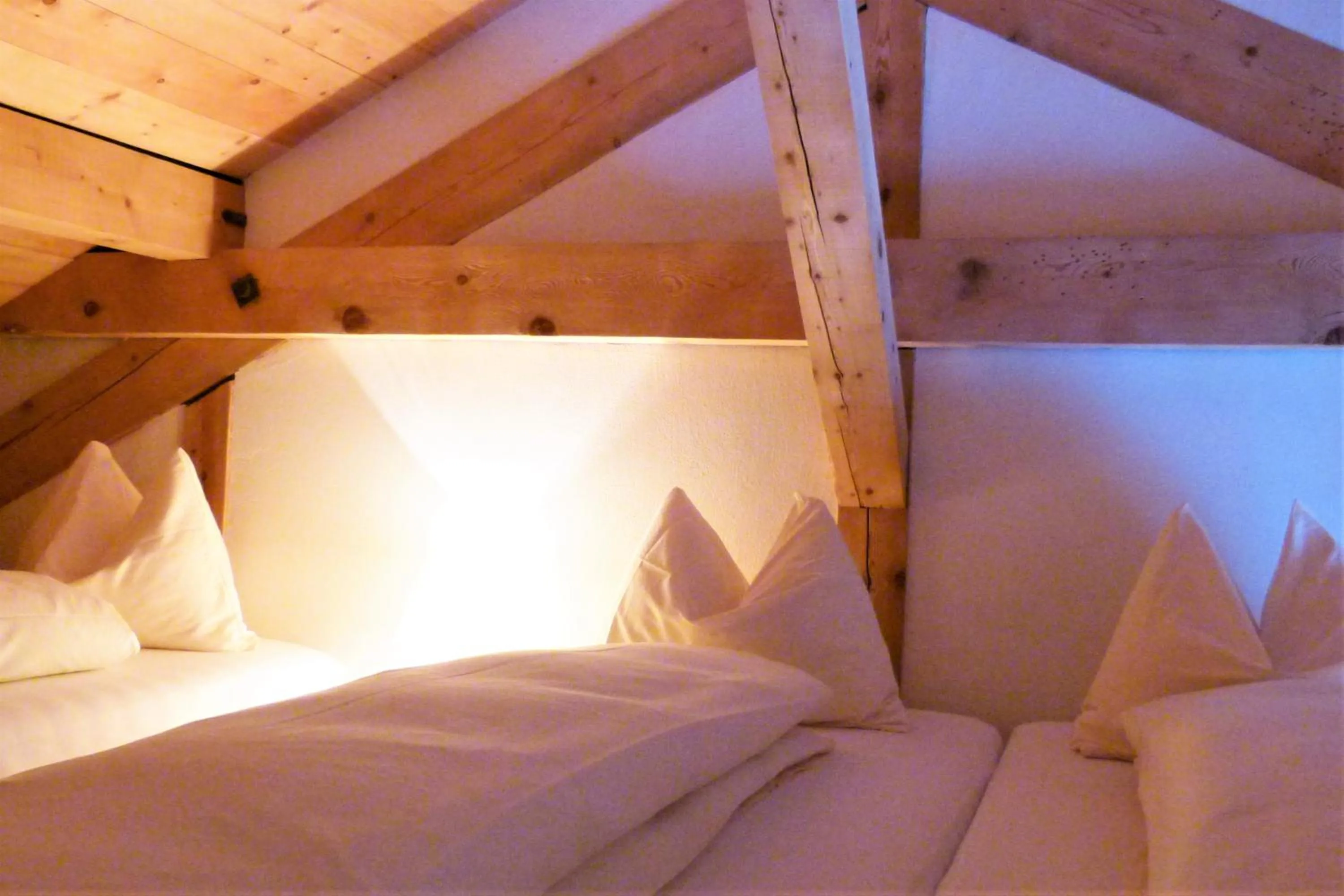 Bed in Hotel Grischuna