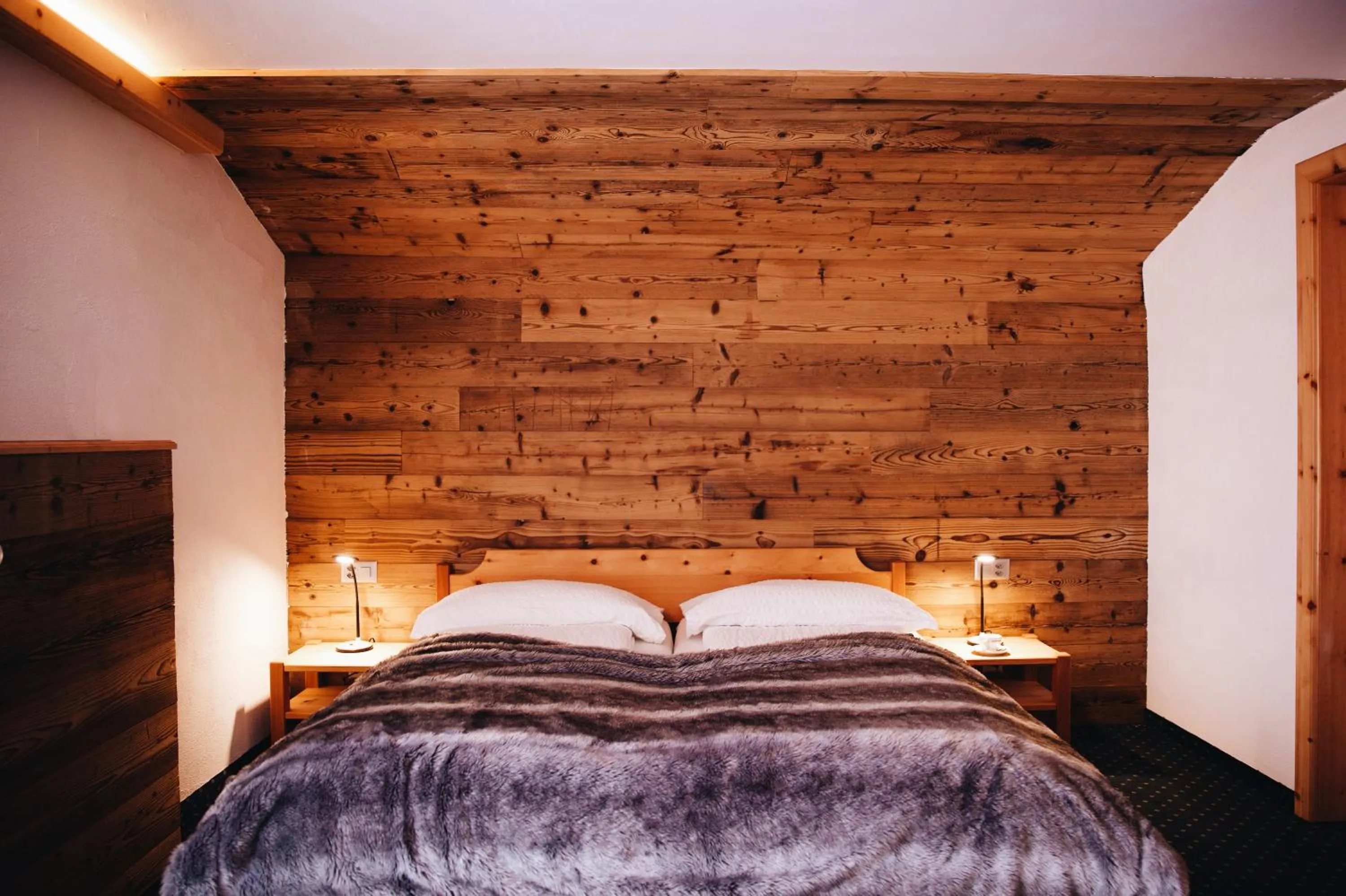 Bed in Hotel Grischuna