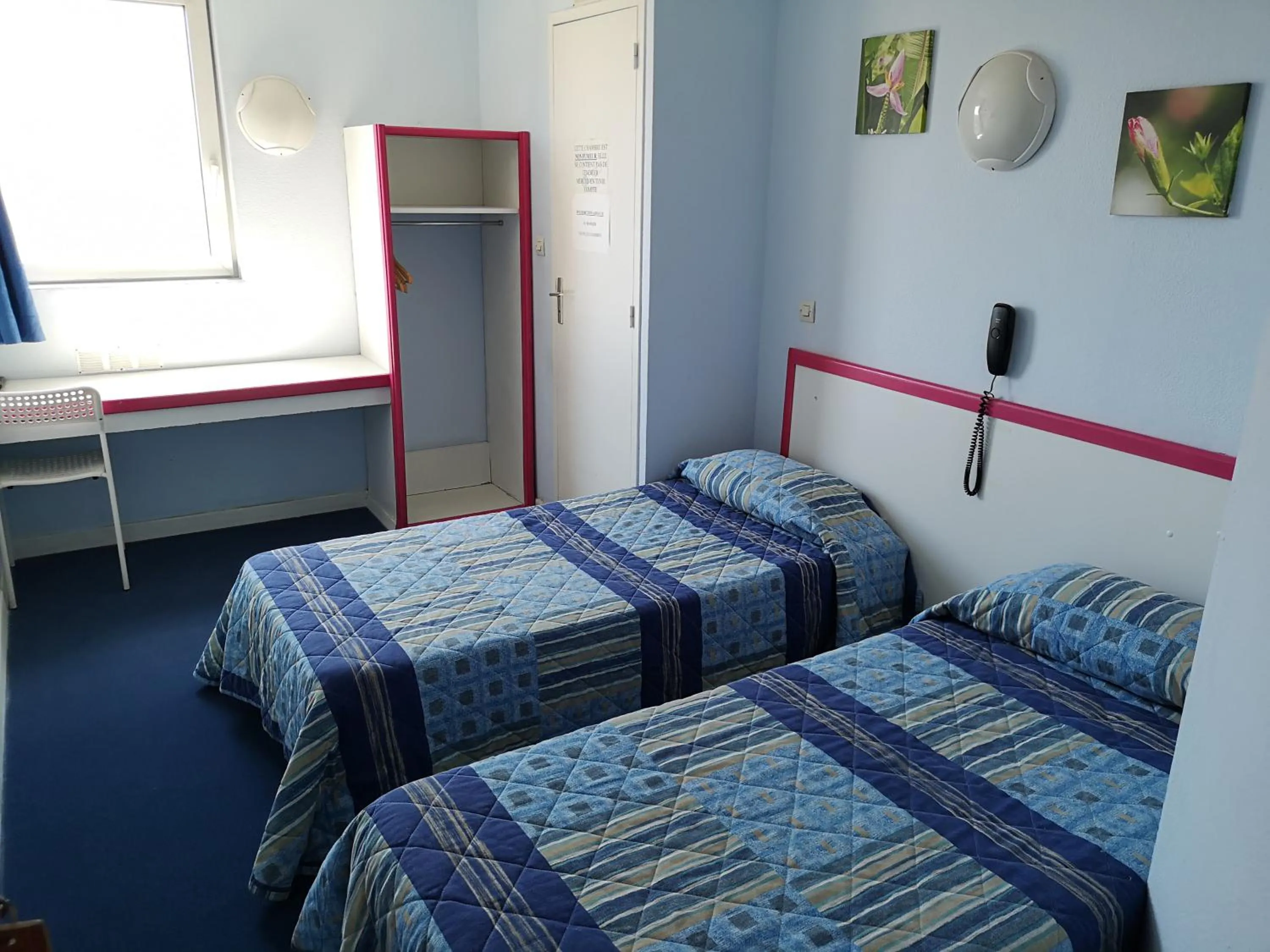 Bed in Hôtel Triotel