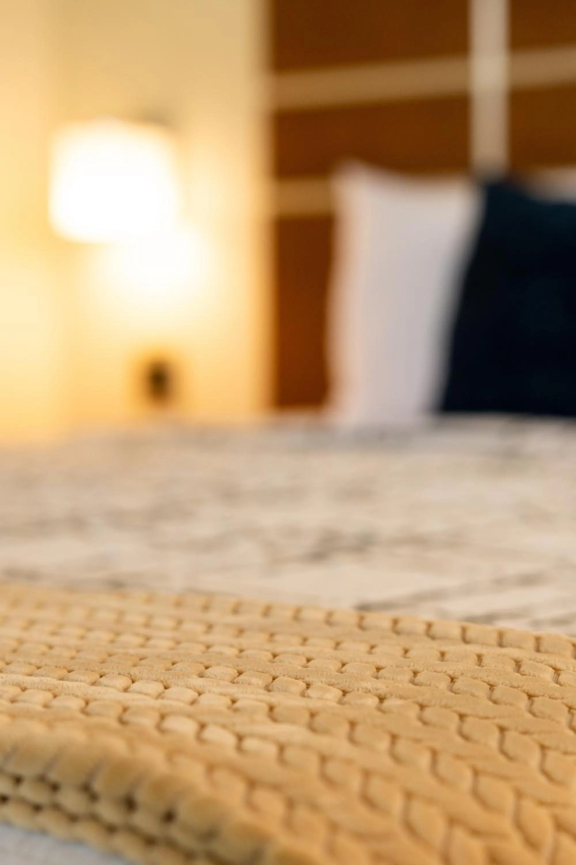 Bed in Lemon Tree Inn