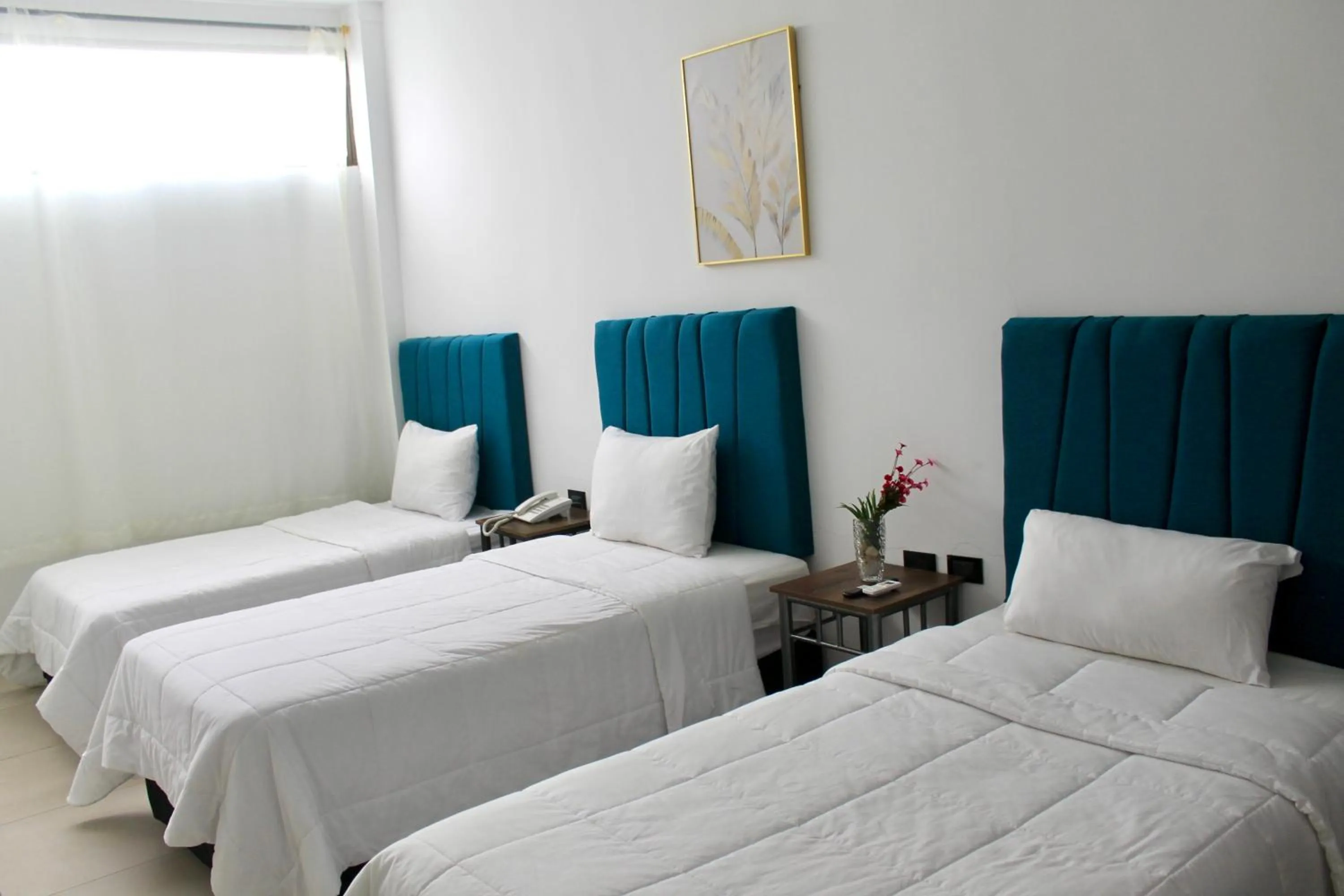 Triple Room in Hotel Presidente Internacional