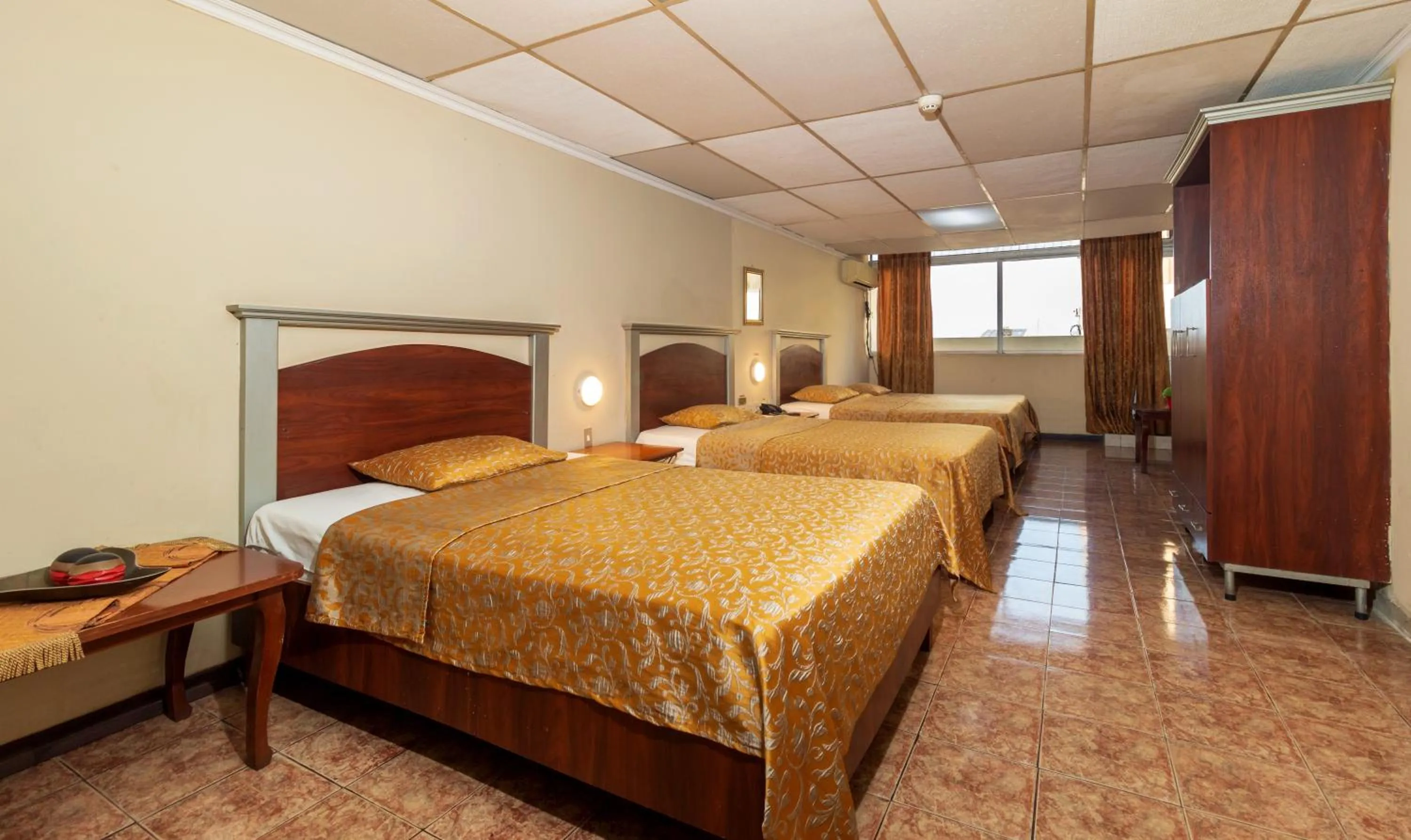 Photo of the whole room, Bed in Hotel Malecon Inn