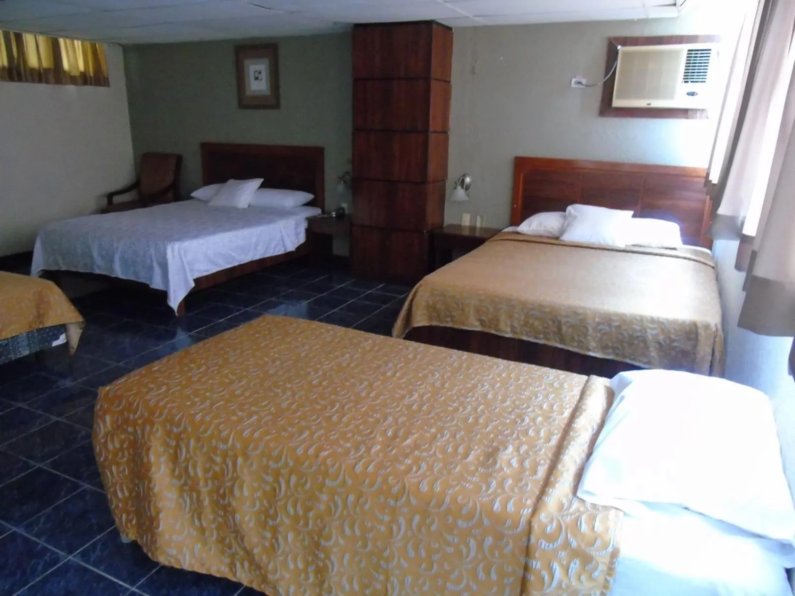 Photo of the whole room, Bed in Hotel Malecon Inn