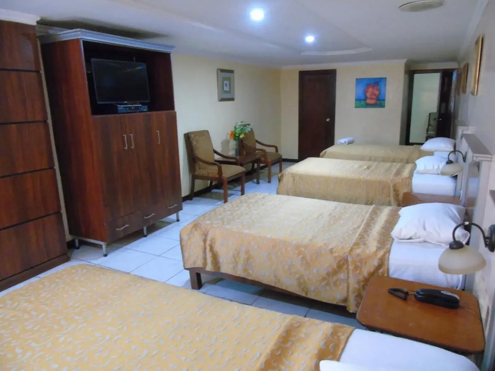 Standard Quadruple Room in Hotel Malecon Inn Standard Quadruple Room in Hotel Malecon Inn