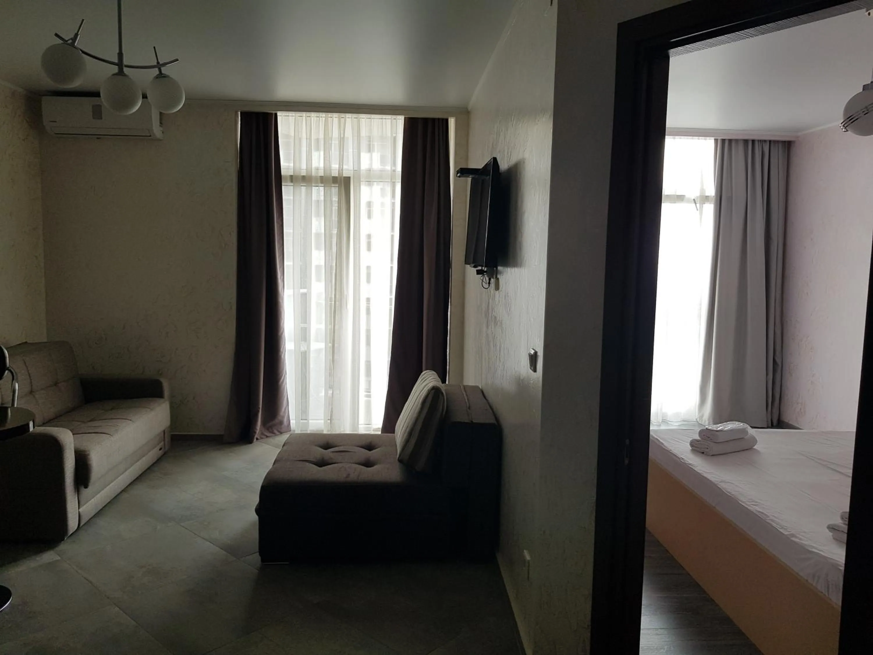 Living room, Bed in Viva Blue Batumi