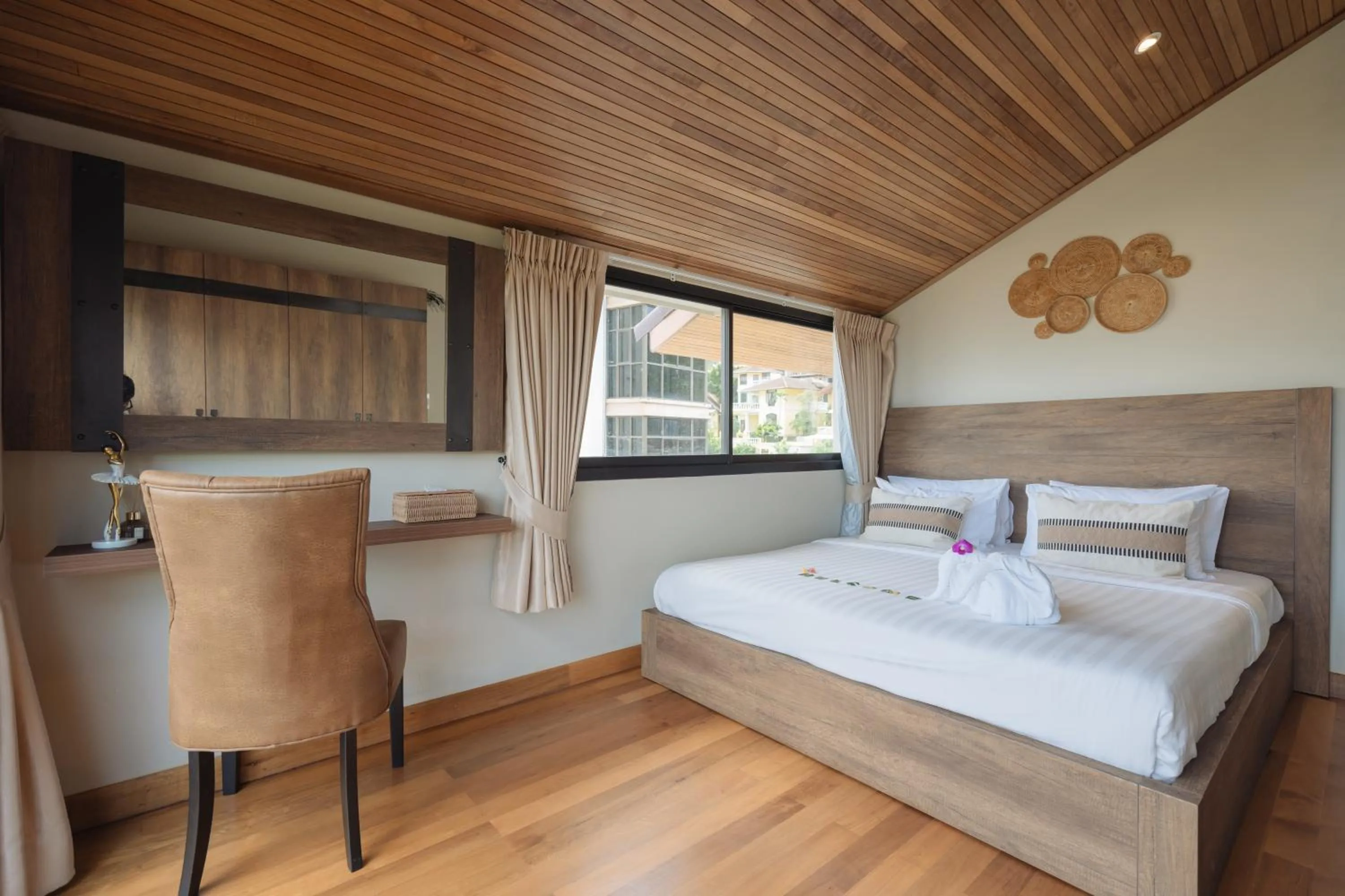 Bed in Club Bamboo Boutique Patong Beach Resort