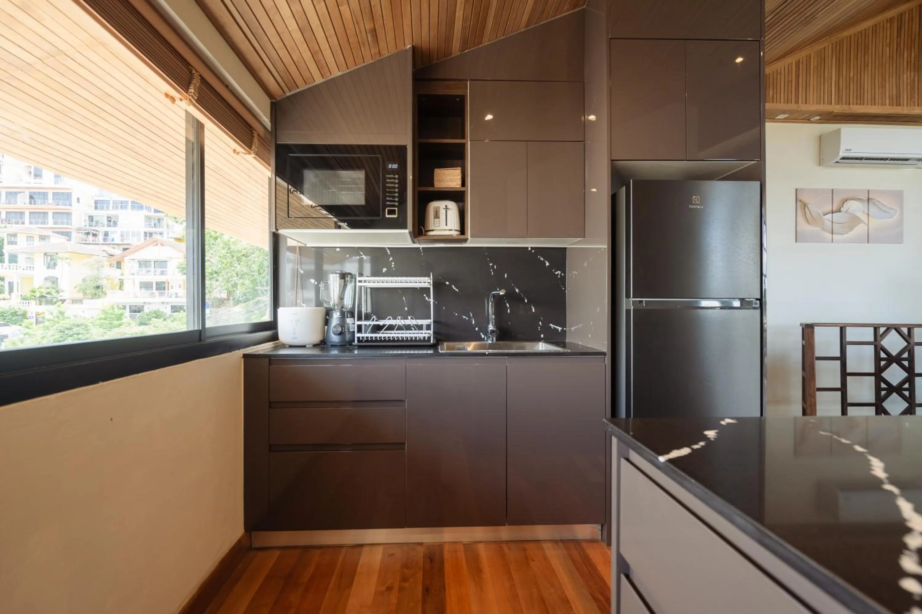 Kitchen or kitchenette in Club Bamboo Boutique Patong Beach Resort