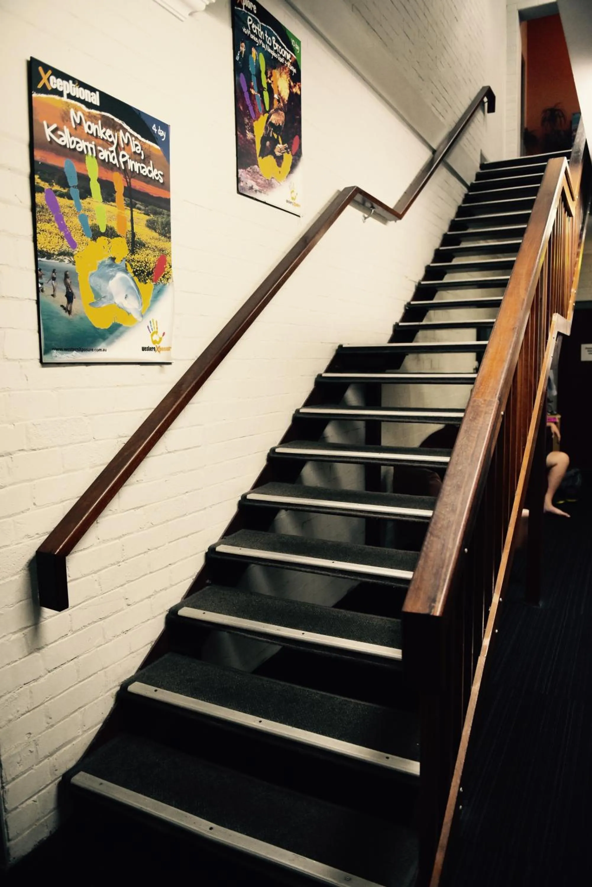 Communal lounge/ TV room in The Emperors Crown Hostel