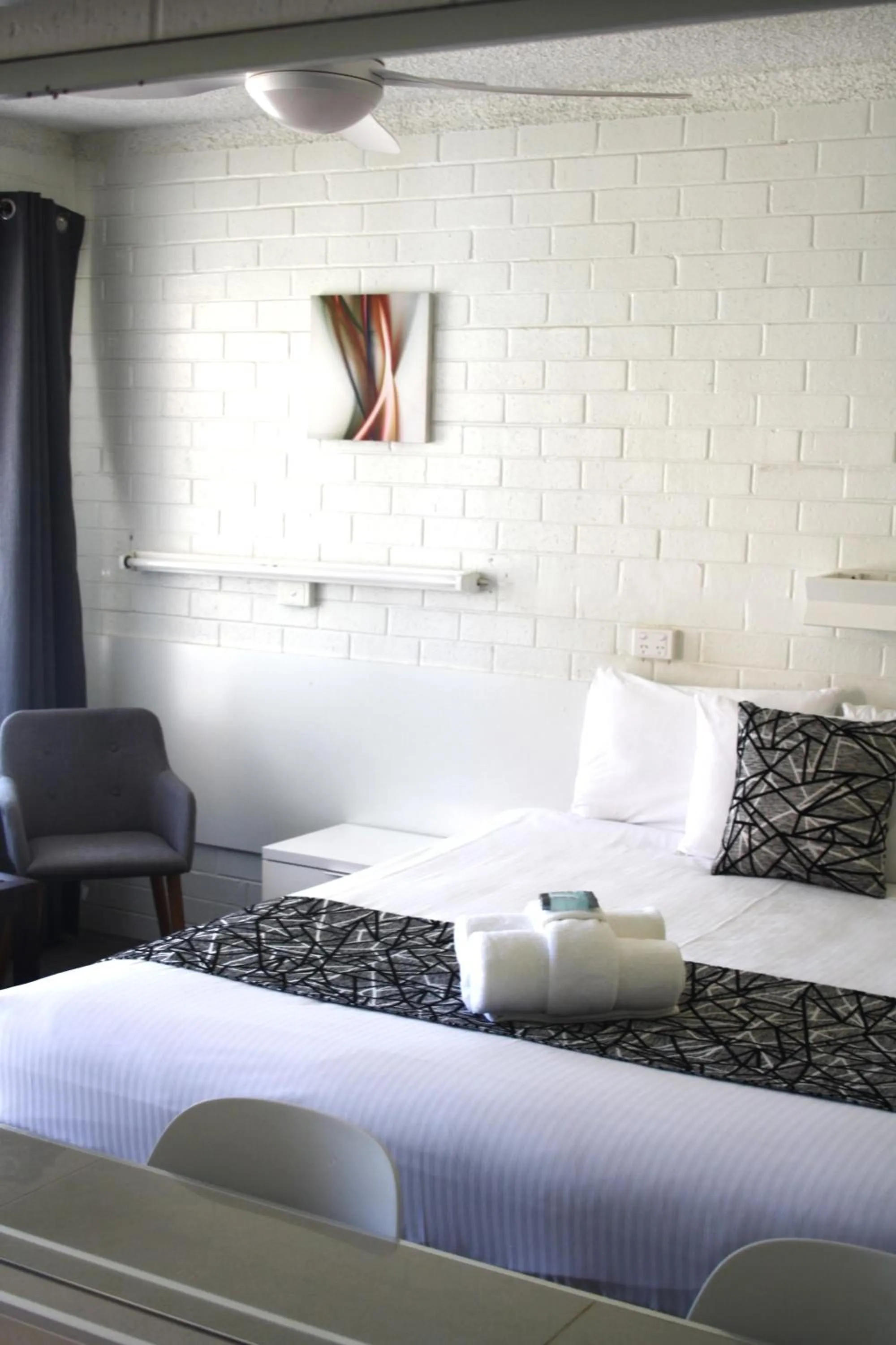 Bed in Coastal Bay Motel