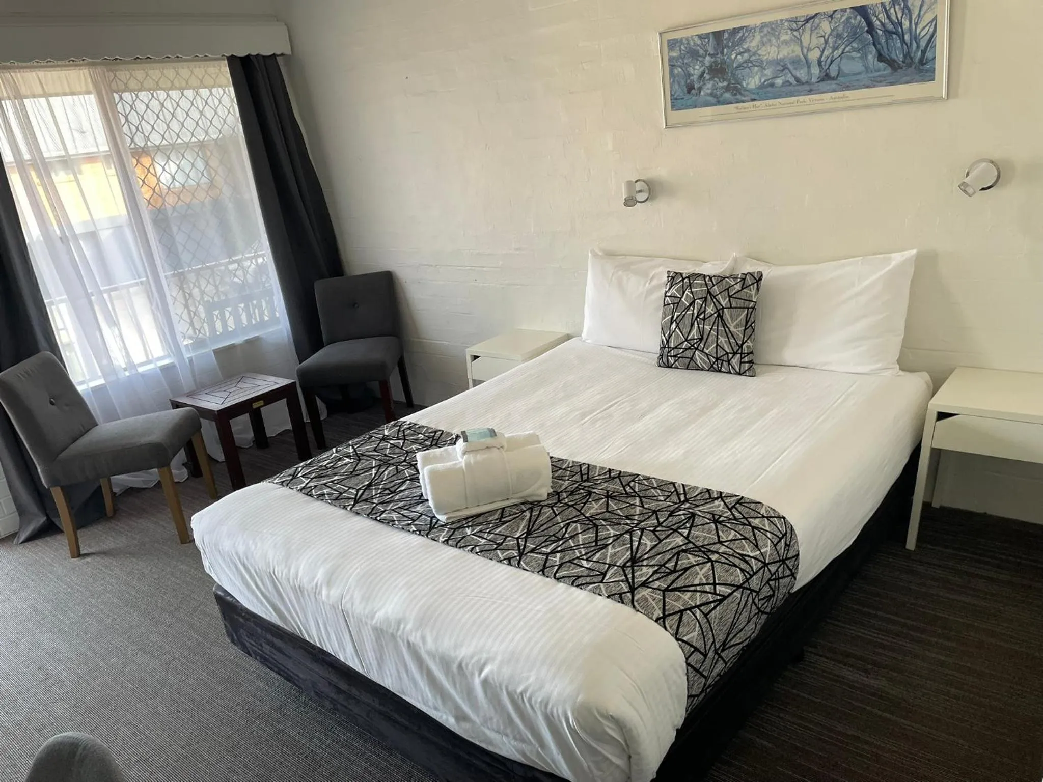 Bed in Coastal Bay Motel