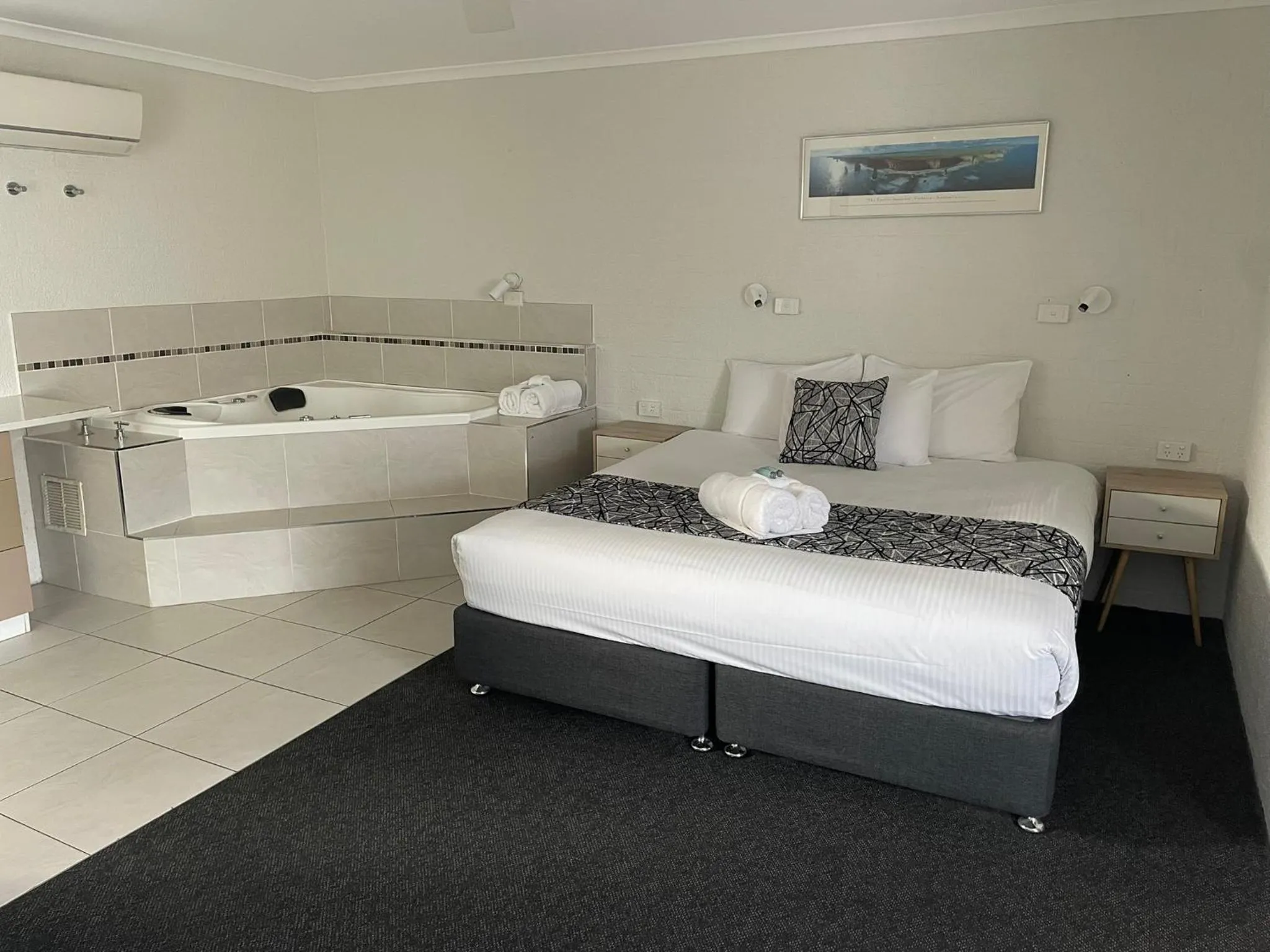 Bed in Coastal Bay Motel