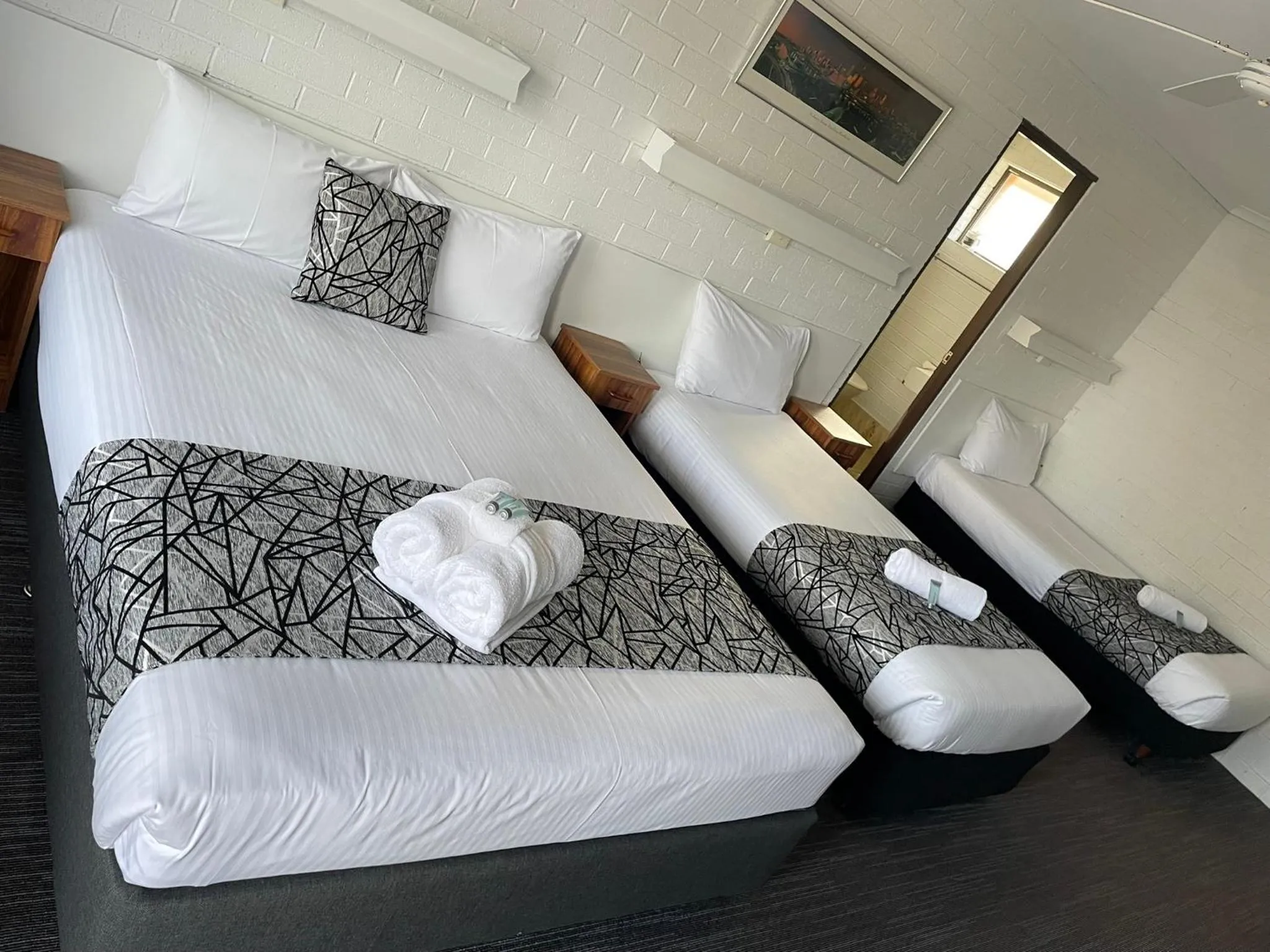 Bed in Coastal Bay Motel